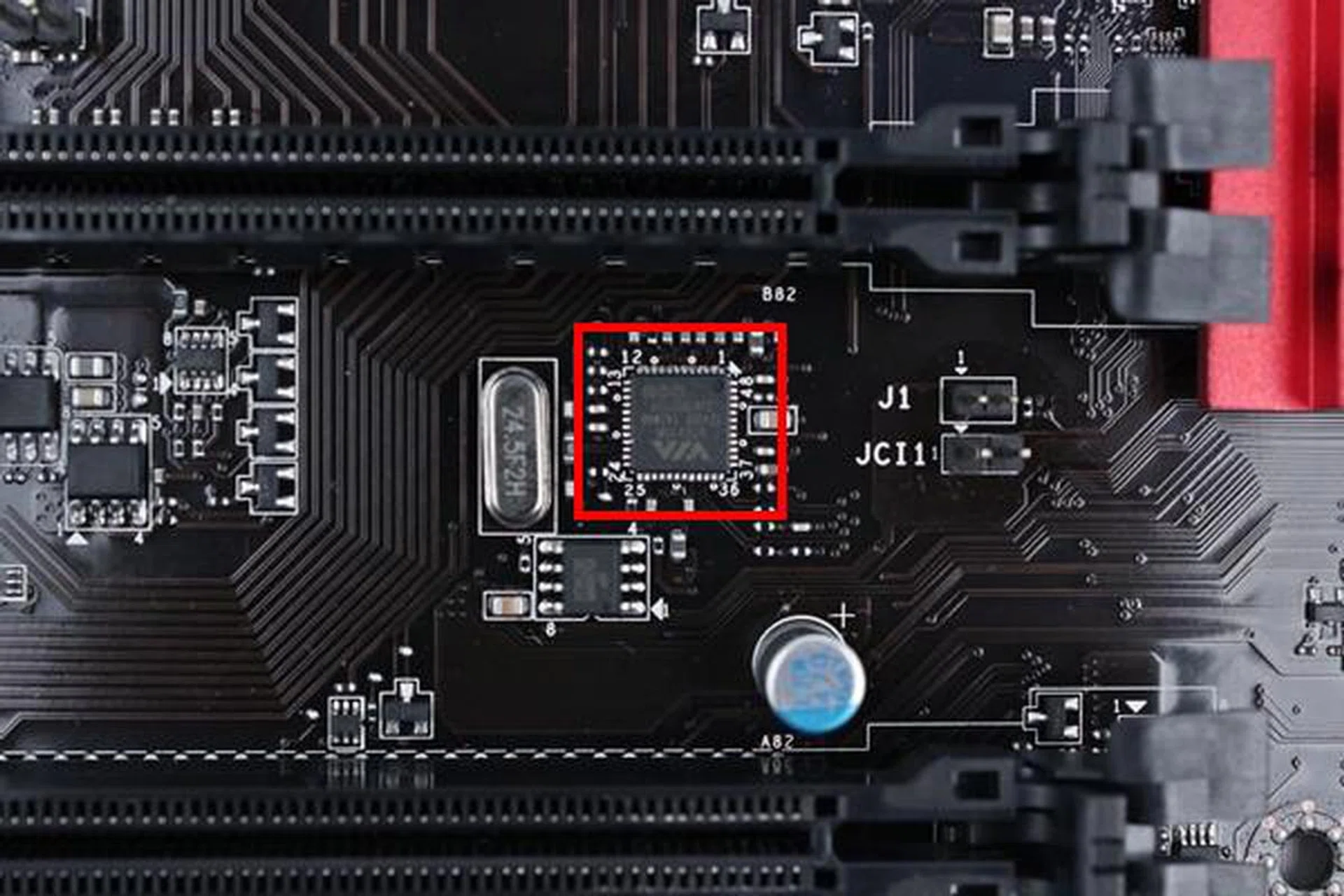 The VIA VT6315N host controller chip that powers the IEEE 1394 expansion connector is located between the second and last PCIe x16 slots.