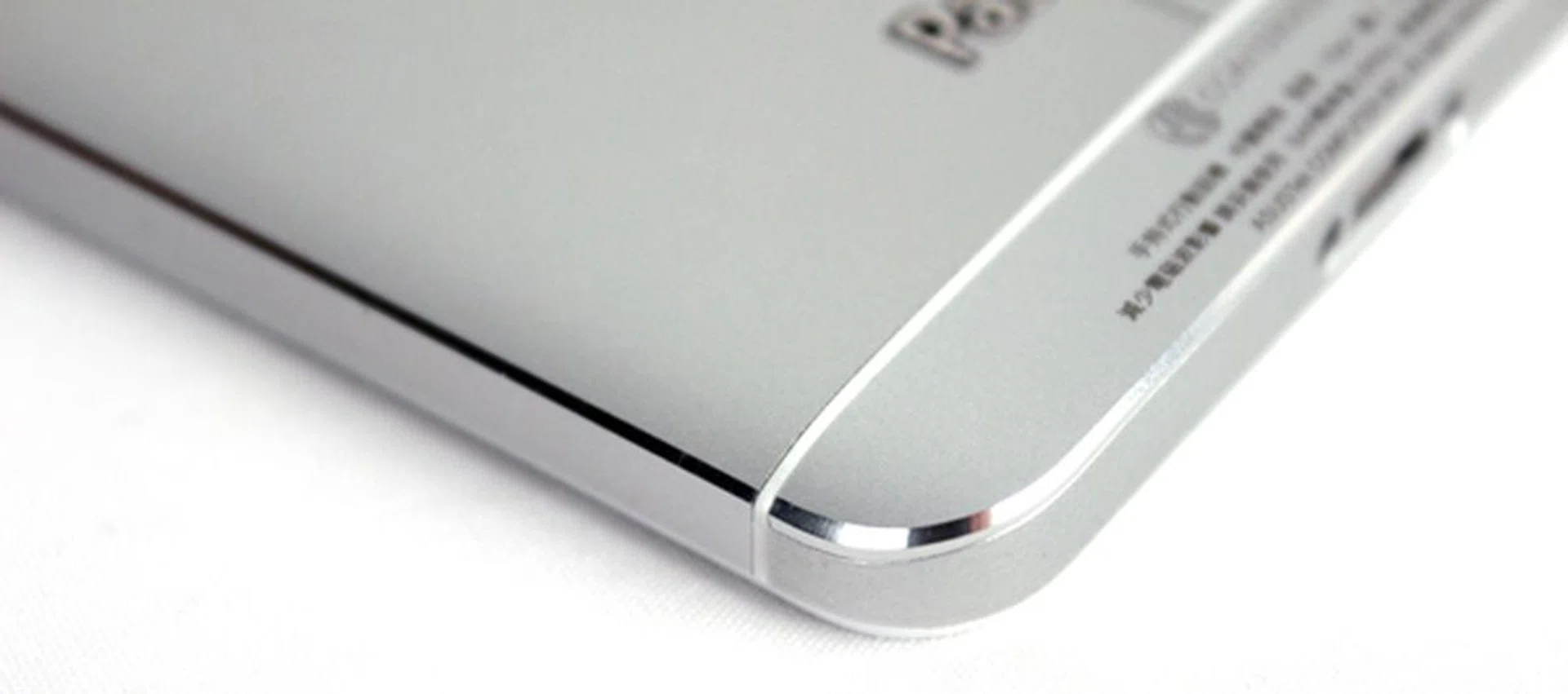 With the exception of chamfered 'diamond cut' edges on the rear edges.