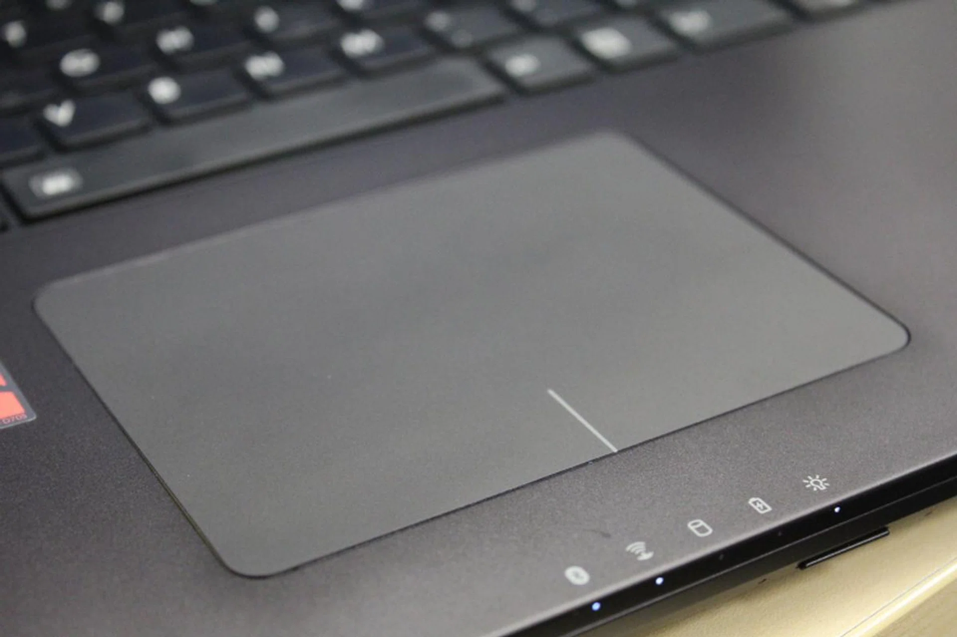 The matte trackpad is functional but like the Aorus X7 Pro, the dividing line is just painted on, making it hard to tell which side of the trackpad you're on without looking at it.
