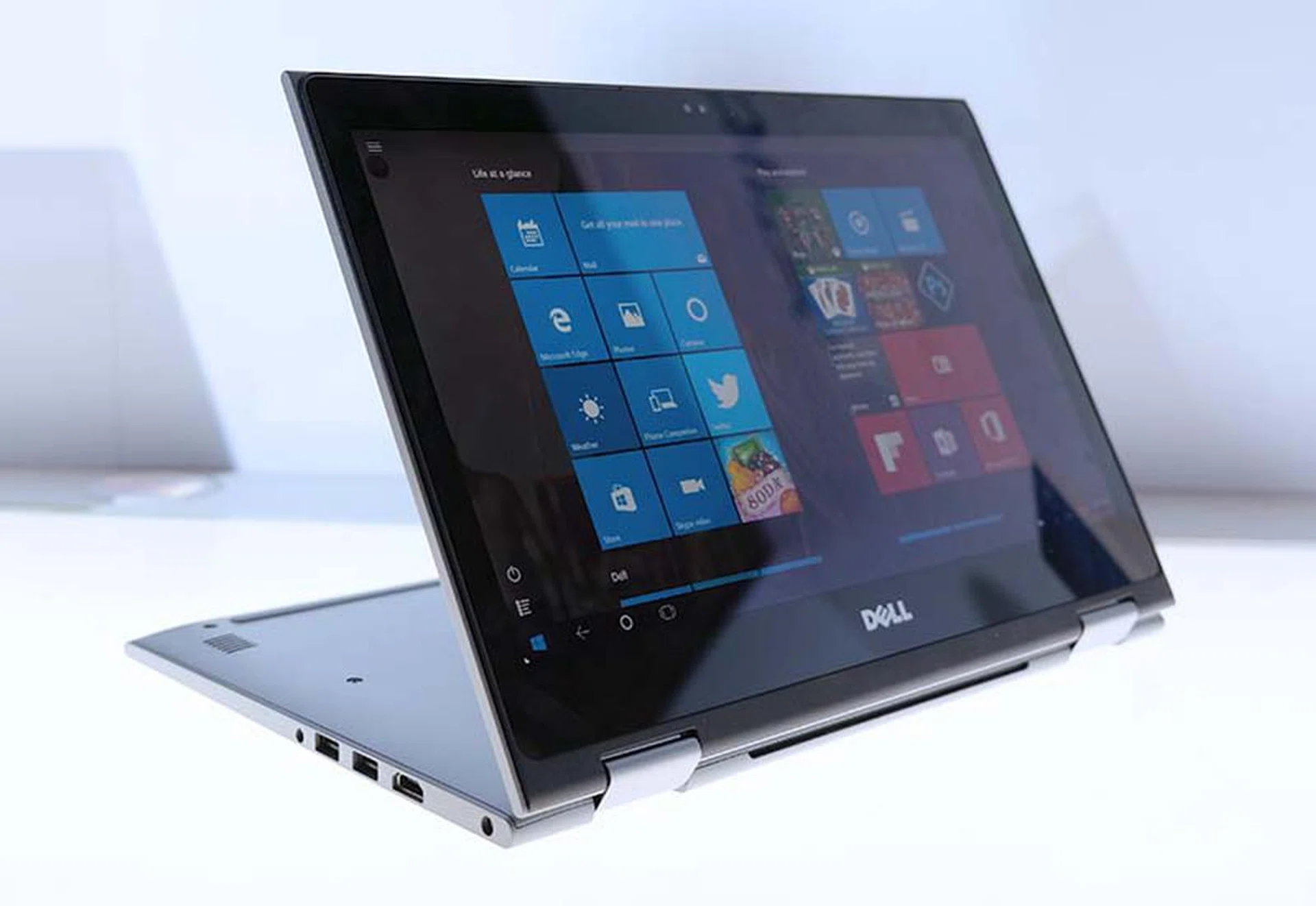 Here's the 13-inch Inspiron 13 5000 2-in-1 notebook in stand mode, which is great for watching videos because you can be closer to the screen.