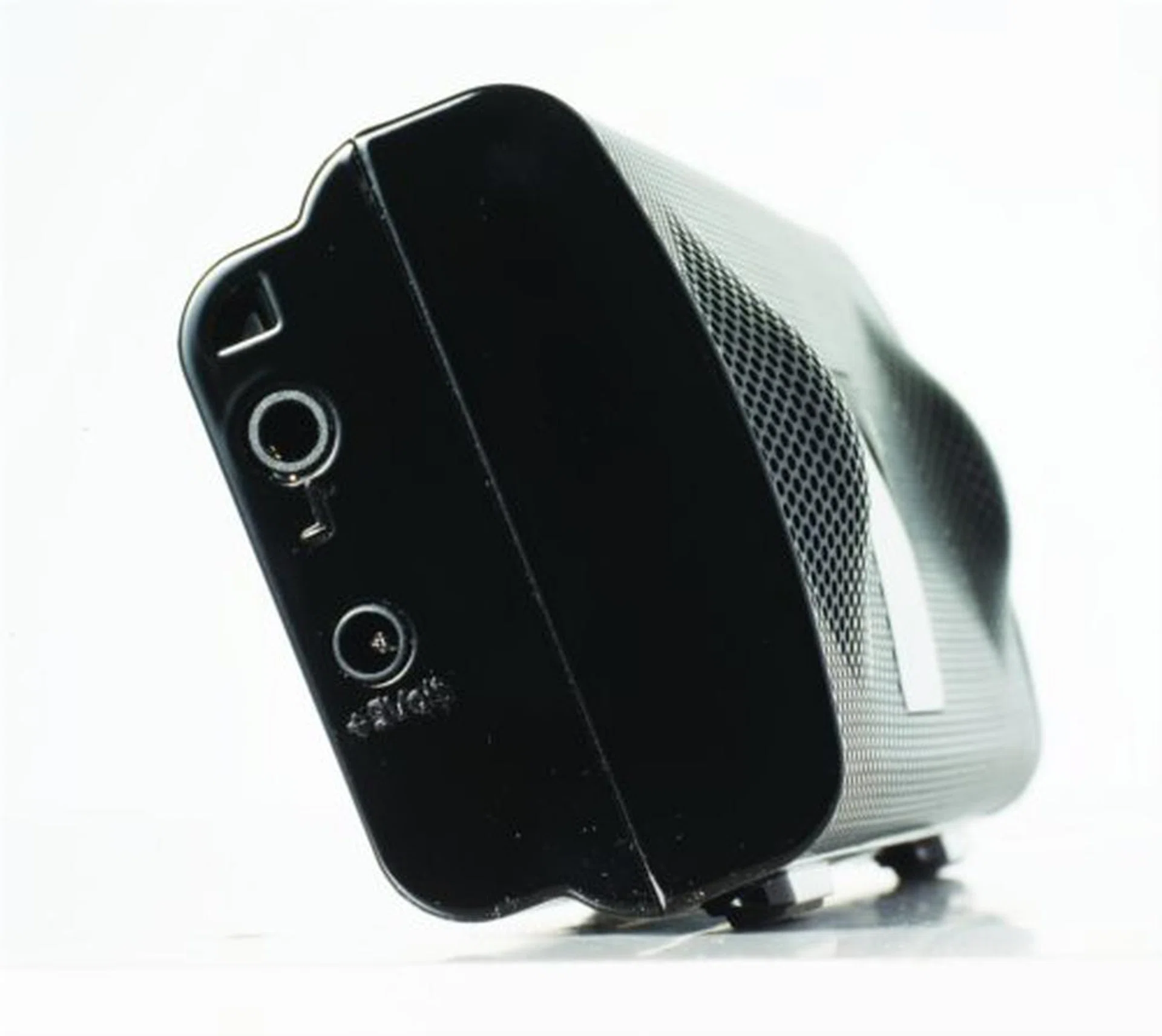 On the left side of the speakers, you can see a 3.5mm audio input jack and the charging port for the battery. The on -board Lithium Ion Battery can power the Foxl v2 for up to five  hours. Also note the raised dual Twoofer drivers. These are proprietary drivers designed to reproduce high, medium and low frequencies from the same speaker, and are dubbed as "Twoofers".