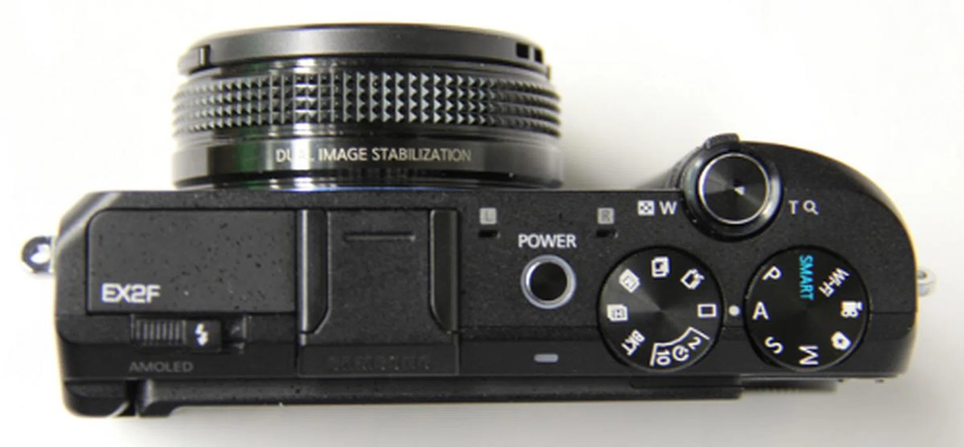 There are two dials located on the top of the EX2F, one being the PASM mode dial, the other is the drive mode dial. 