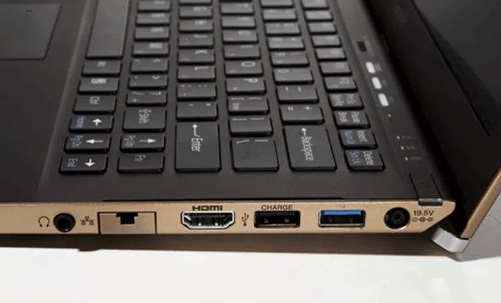 Note the second port from the right, right next to the power port. Yes it does look like a USB 3.0 port, but it's actually a ThunderBolt port in disguise! You are also more than welcome to plug USB 3.0 devices into this port. Other ports include an additional USB 2.0 port, HDMI, Gigabit LAN and a headphones jack.