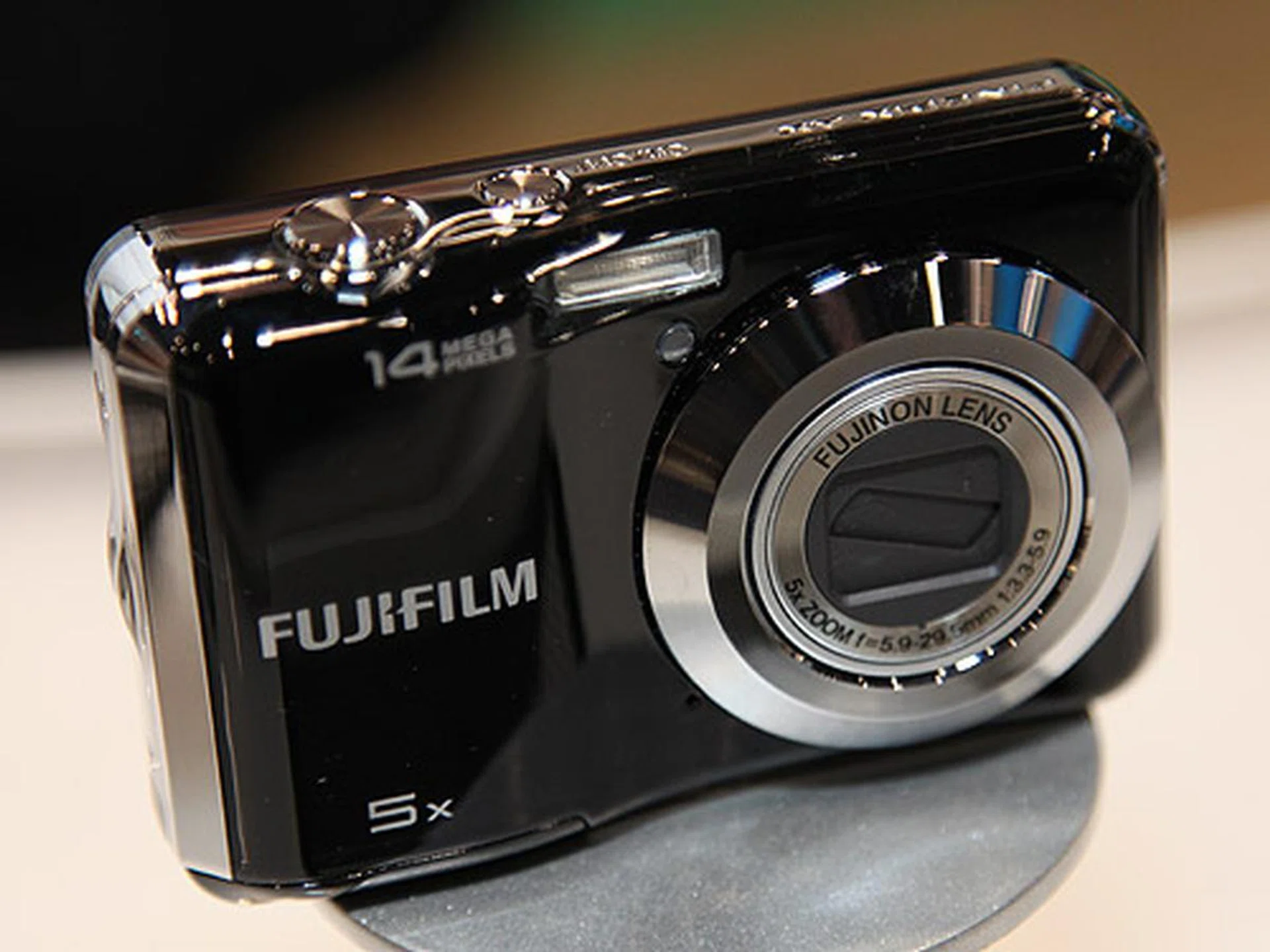 The FinePix AX300 is yet another budget 14 Megapixel camera with a longer 5x optical zoom lens.