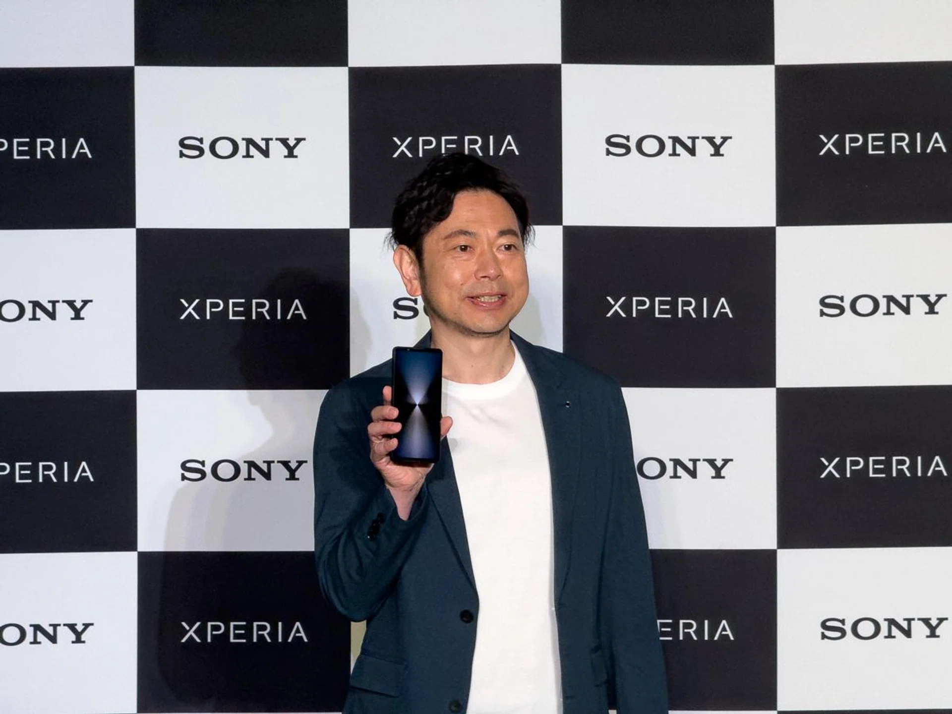 Masaaki Oshima, Business Manager, Mobile Communications Division, Sony, showing off the Xperia 1 VI.