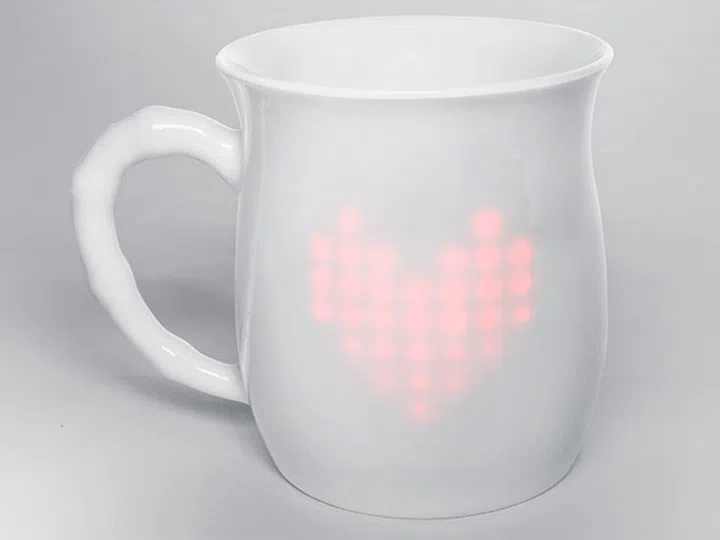 Smart coffee mug that connects to the onesie, so parents can be notified of the baby's condition.