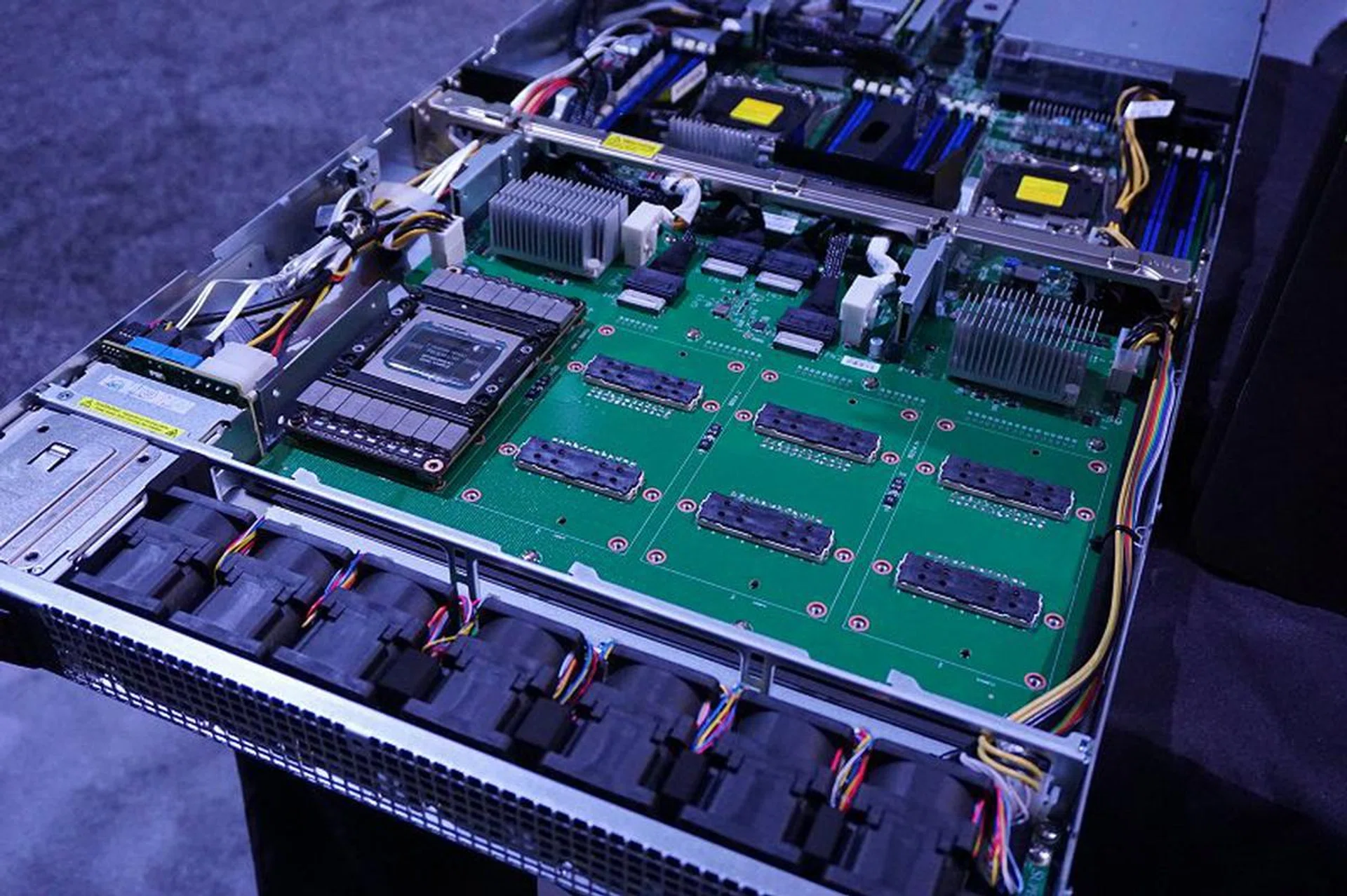 This rack shows that it can take in up to four Tesla P100 computing units as seen by its NVLink connectors on the motherboard.