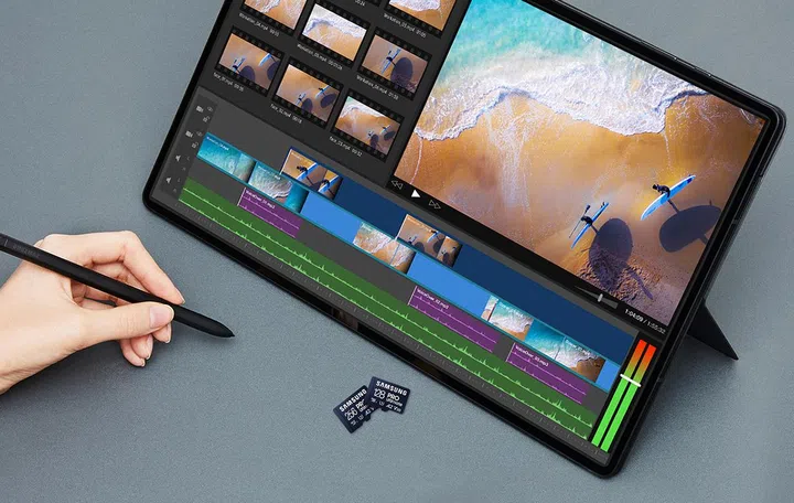 Samsung Pro Ultimate microSD, in front of tablet, on the desk.