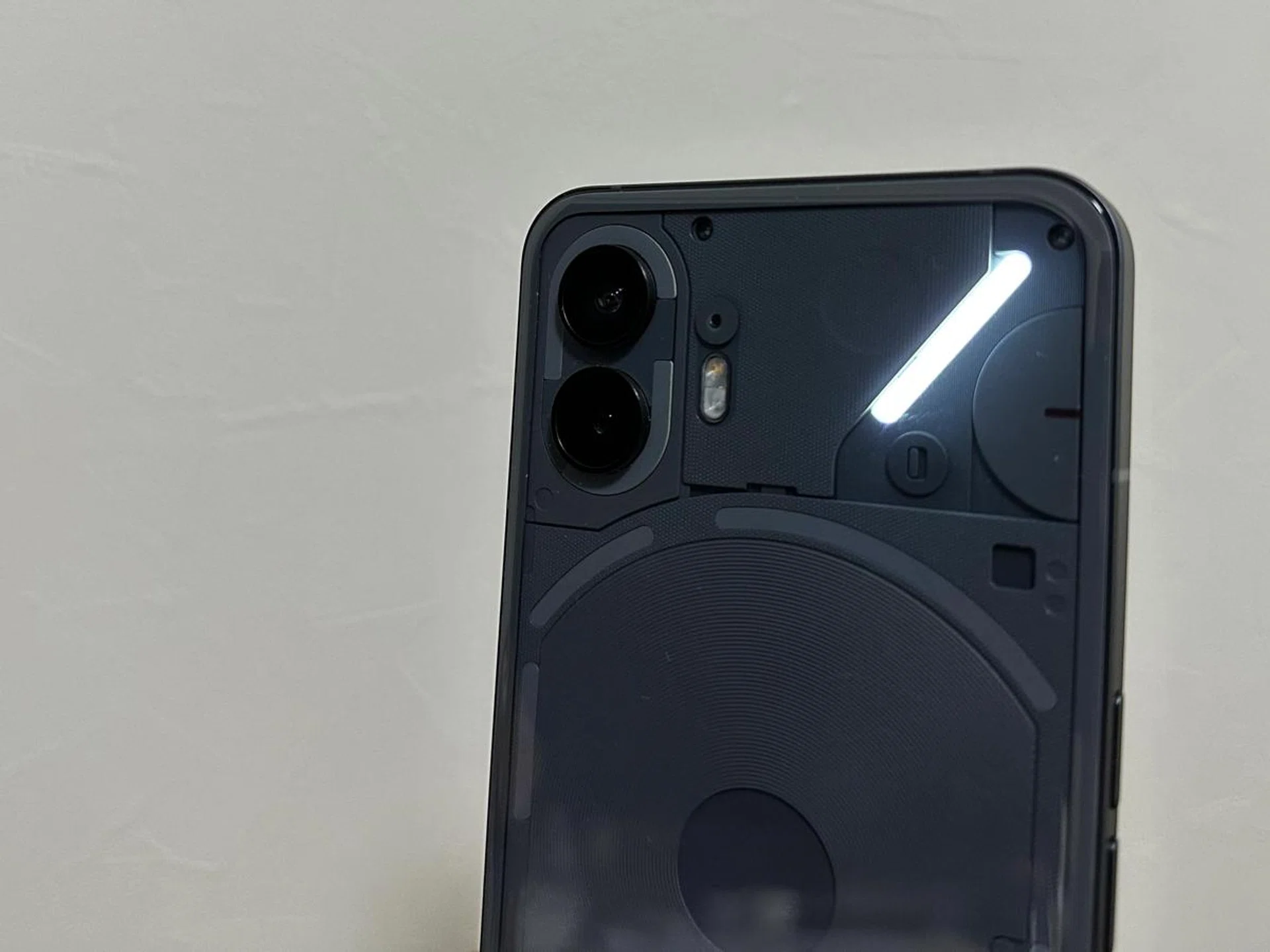 Nothing Phone (2) with Essential Notifications notification lit up.