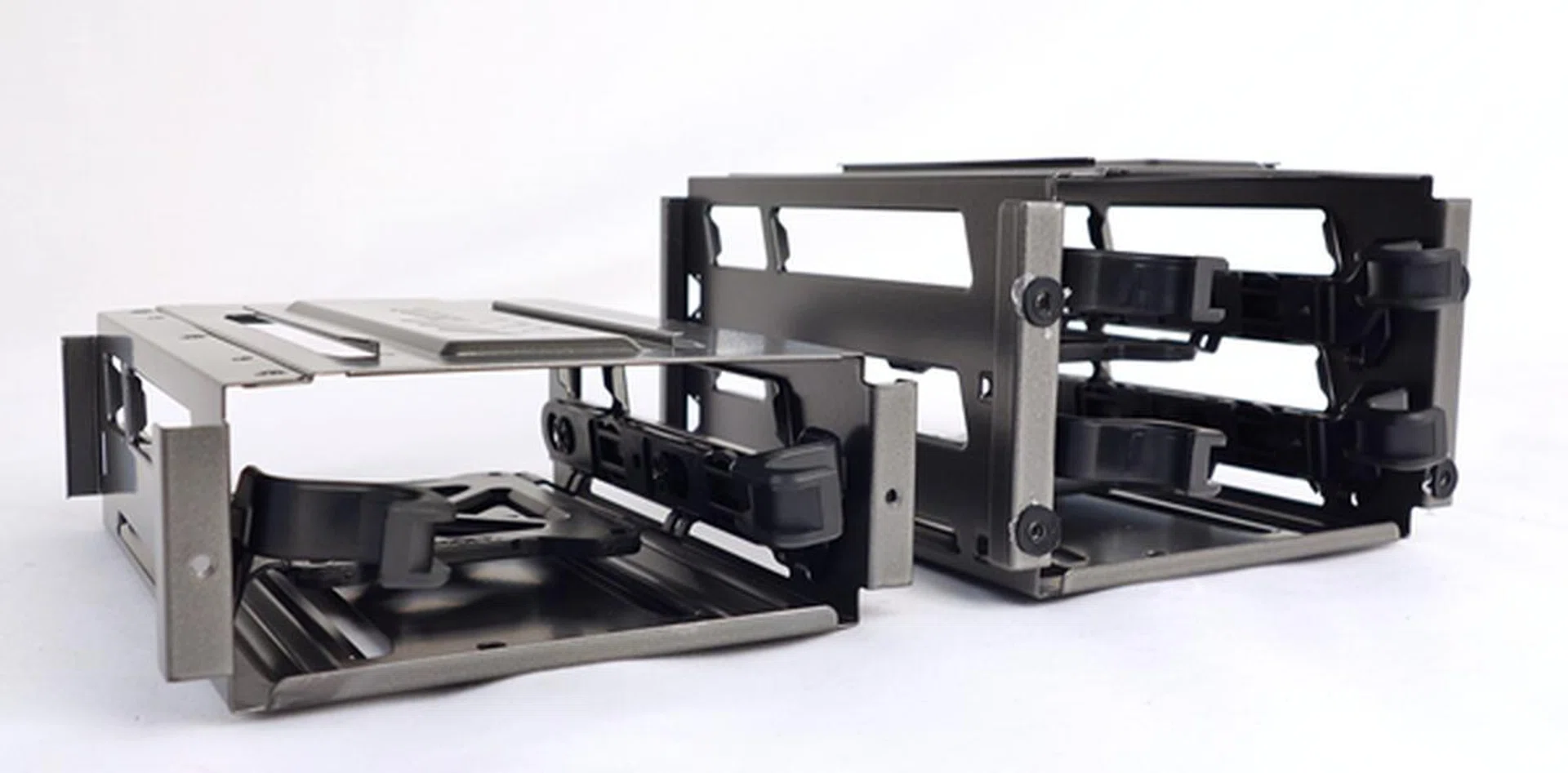 The other two 3.5-inch drive enclosures; the one on the left only can fit one drive, while the 2-drive enclosure is on the right.