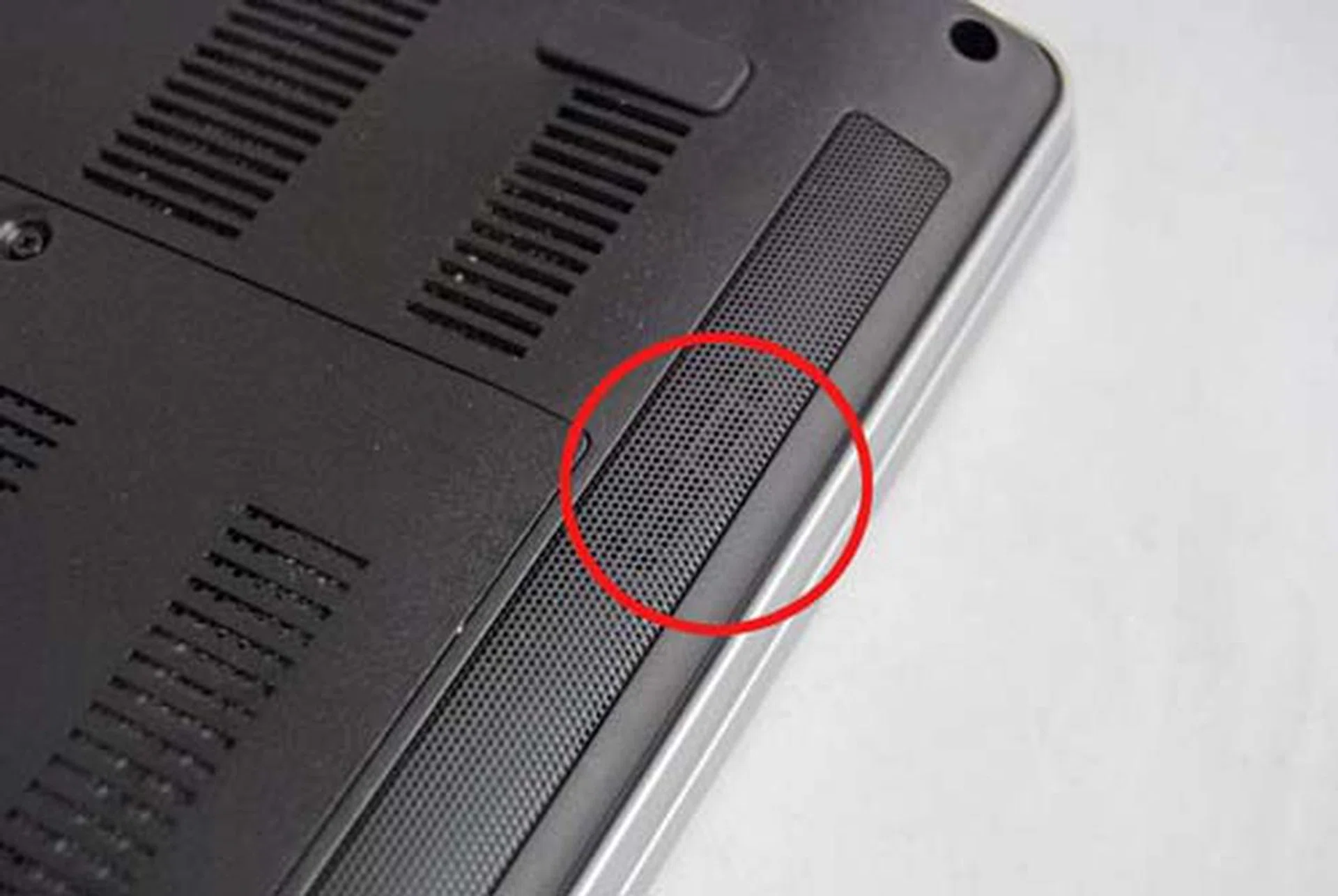 The speakers are located at the underside front of the notebook.