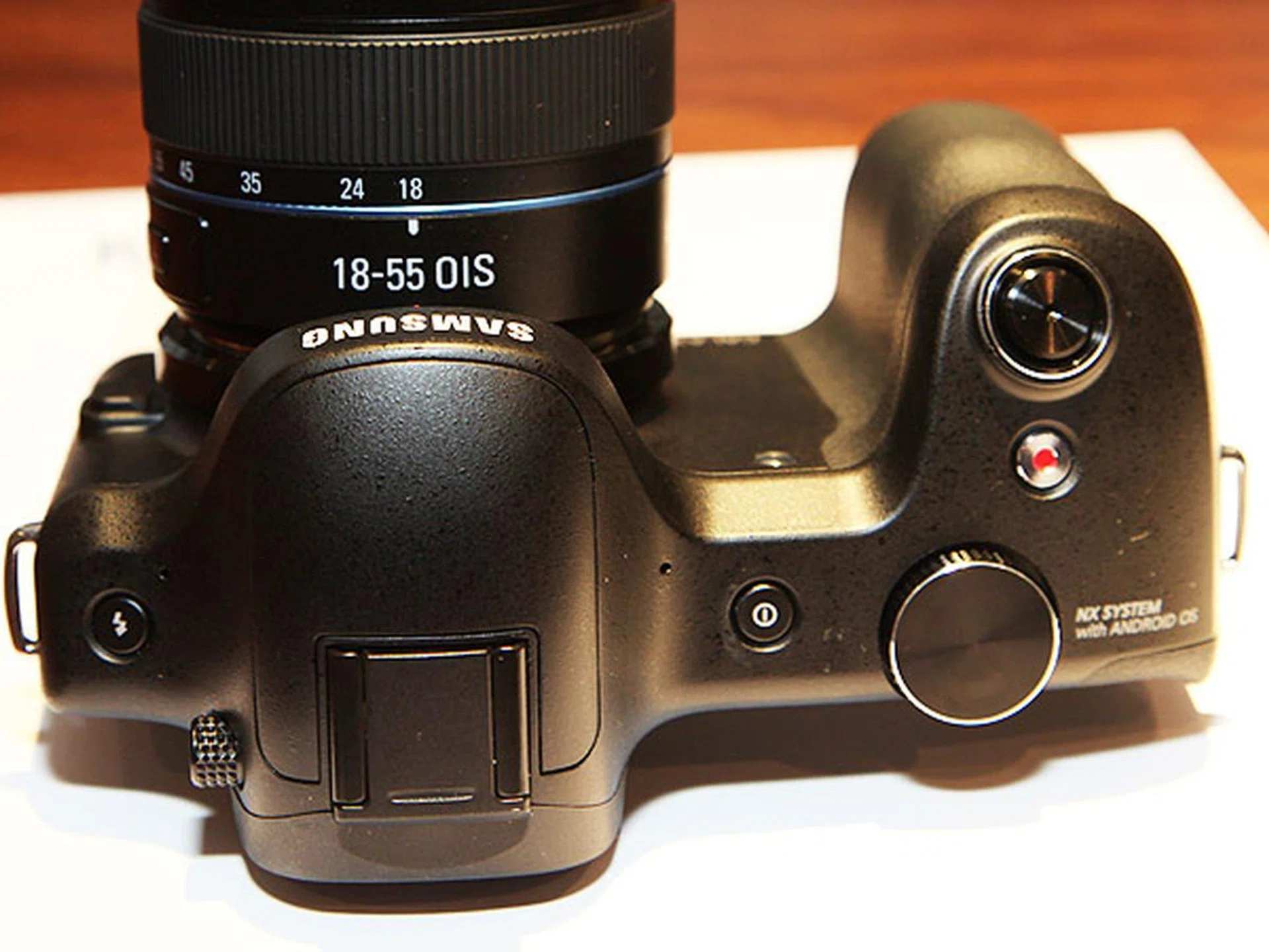 The Samsung Galaxy NX doesn't come with an awful lot of buttons as settings can be easily controlled using the on-screen interface.