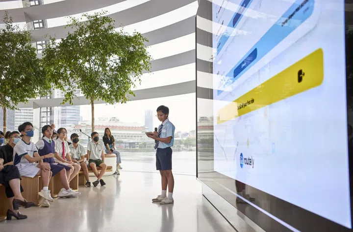 A student from Ngee Ann Secondary School presenting their app, Routely, to audiences at the Swift Explorers Singapore celebration at Apple Marina Bay Sands. PHOTO: APPLE
