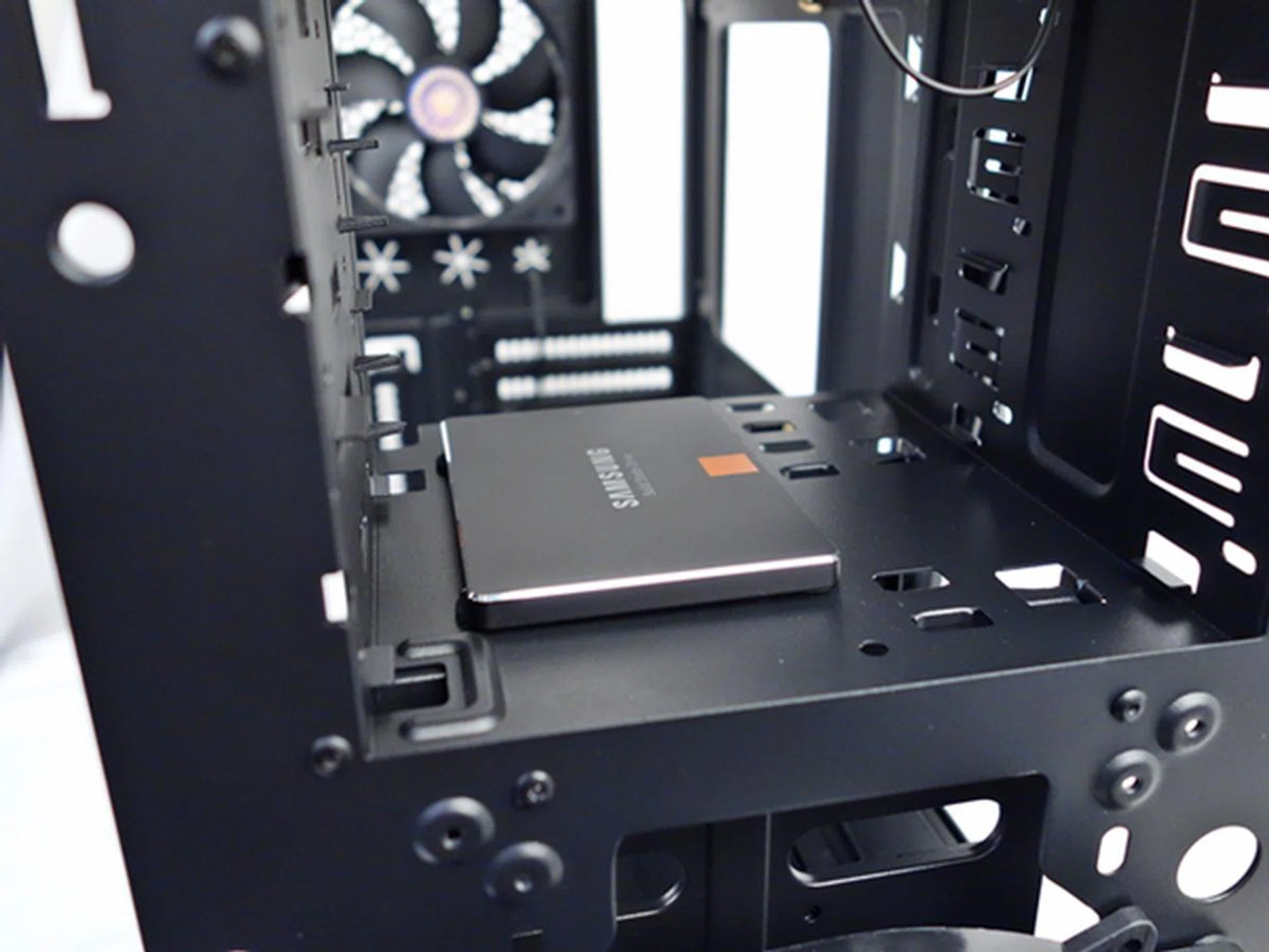 There are four mounting holes at the bottom of the ODD bay.