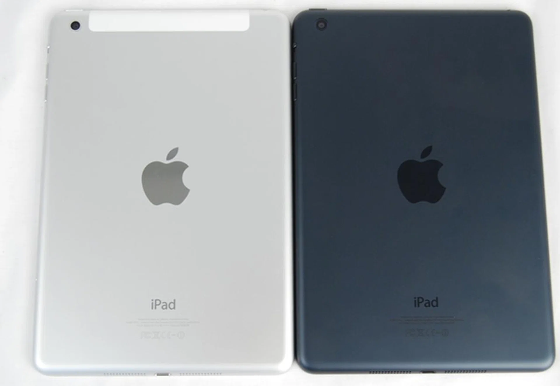 The cellular model of the Apple iPad mini (left) will have an antenna cover at the top section of its back. 