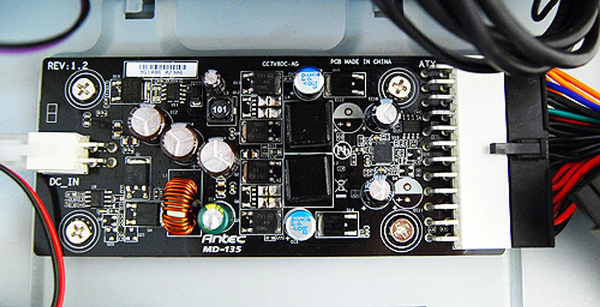 The PSU component or to be more accurate, the power distribution unit on the Antec ISK300-65 is marked MD-135 and it helps supply power to the various components in the system requiring various voltage level inputs. In turn, the various power connectors are connected to it via a standard ATX connector.