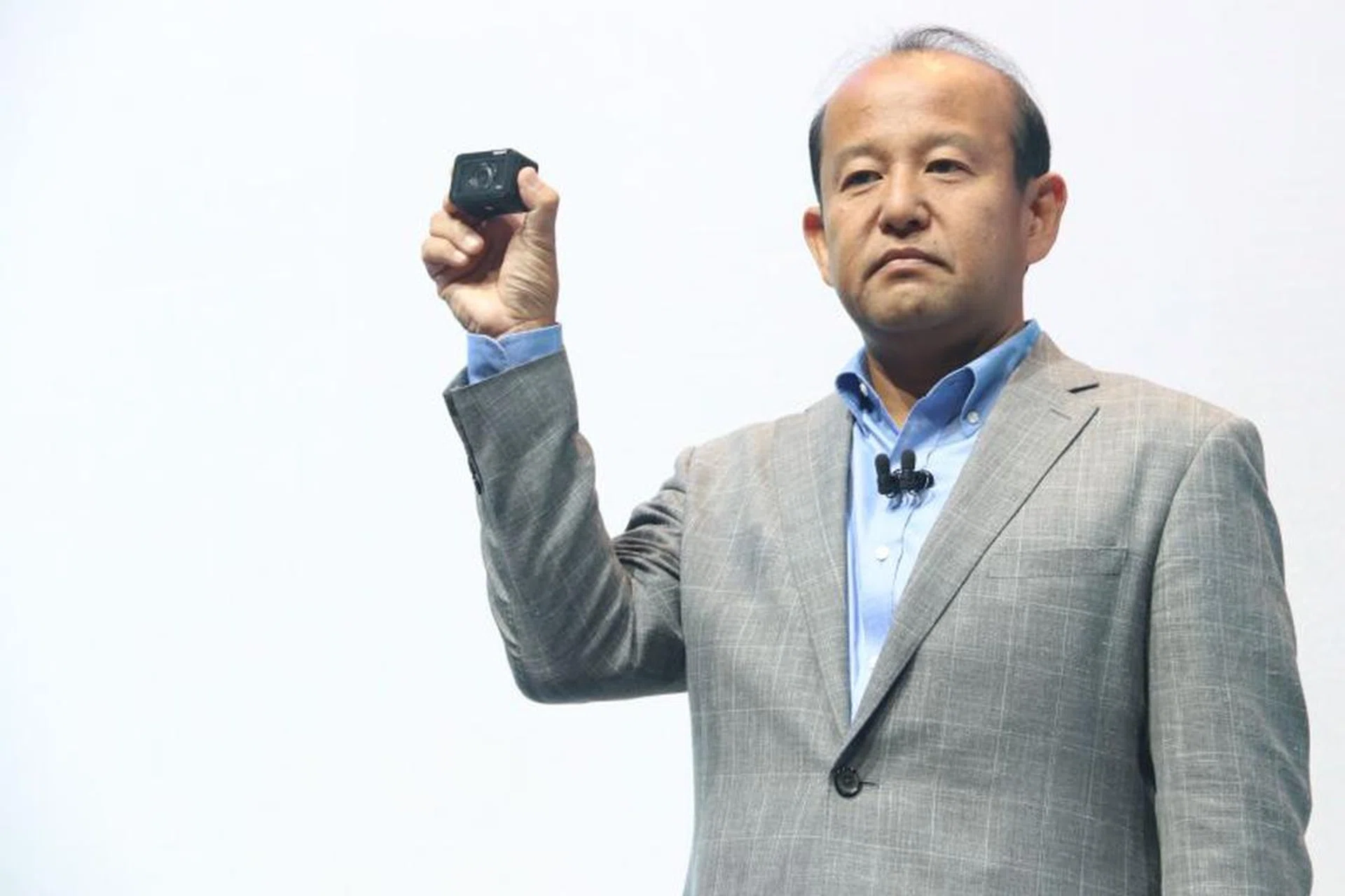 Kumekawa holding Sony's new RX0 digital camera.