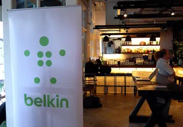 Belkin showcased their new corporate logo today, as shown on the banner gracing the cosy interior of Hummerstons. Belkin's rebranding is also partially inspired by the return of their founder, Chet Pipkin, who's now President and CEO of the networking and connectivity devices company. 