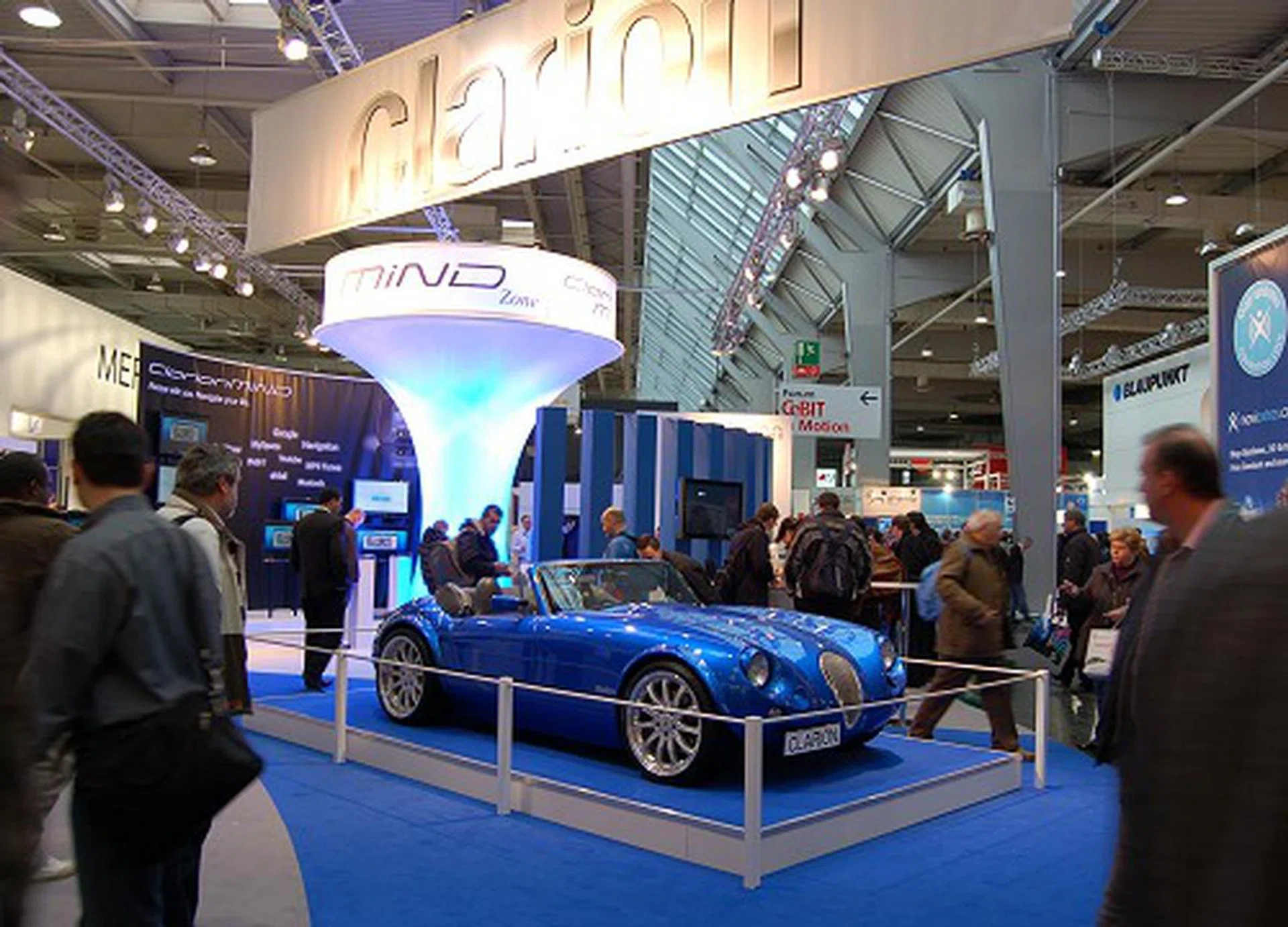  Clarion had a really swell car to draw in extra crowd. Not that it needed it for it wasn't the star of the show. Instead, something much more smaller and 'powerful' was the star of their booth.  