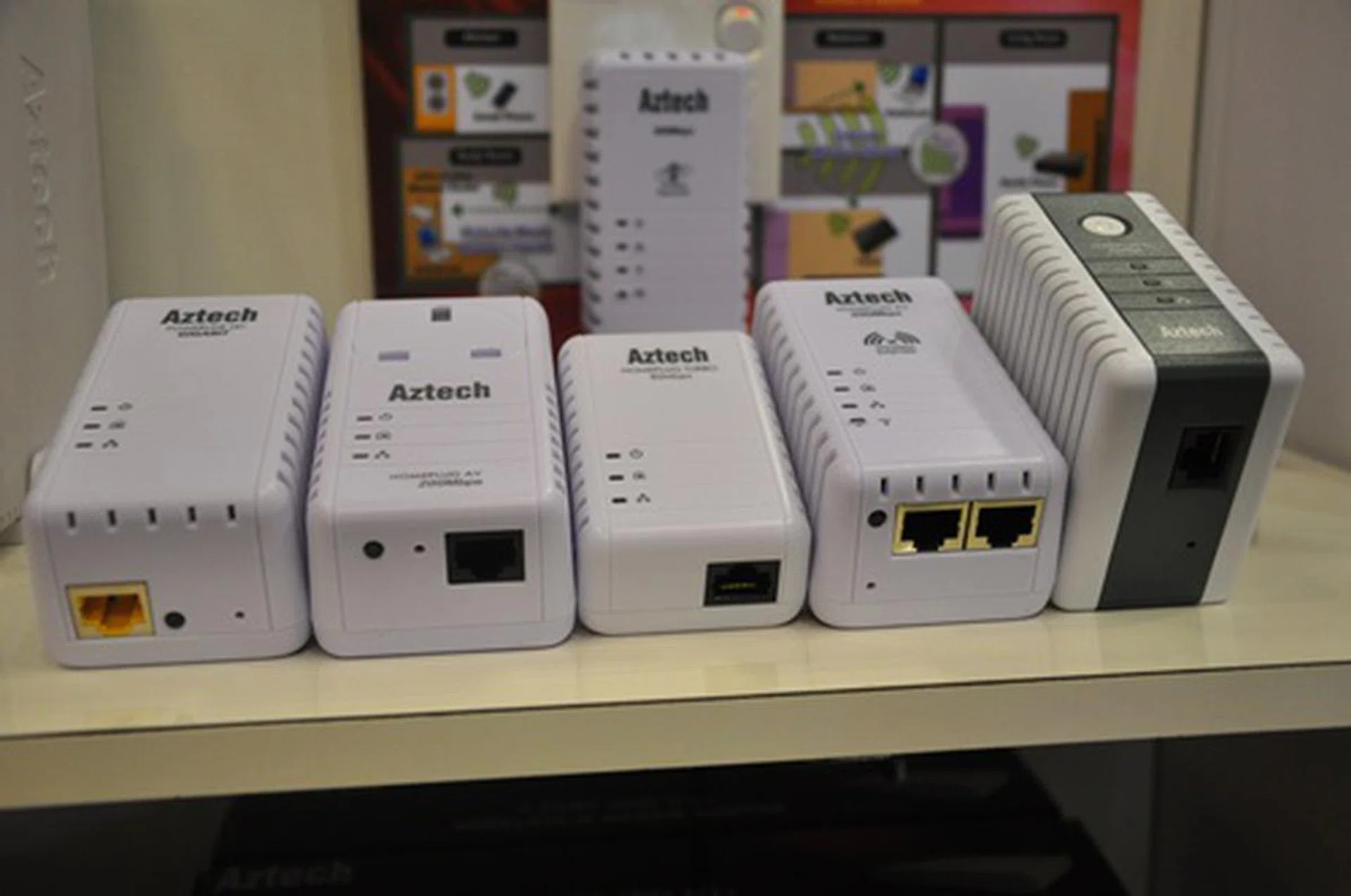 Looking for Homeplug Ethernet adapters? At the Aztech booth, they can range from $32 (85Mbps, Model HL106E) to $69 (1000Mbps, Model HL280E).