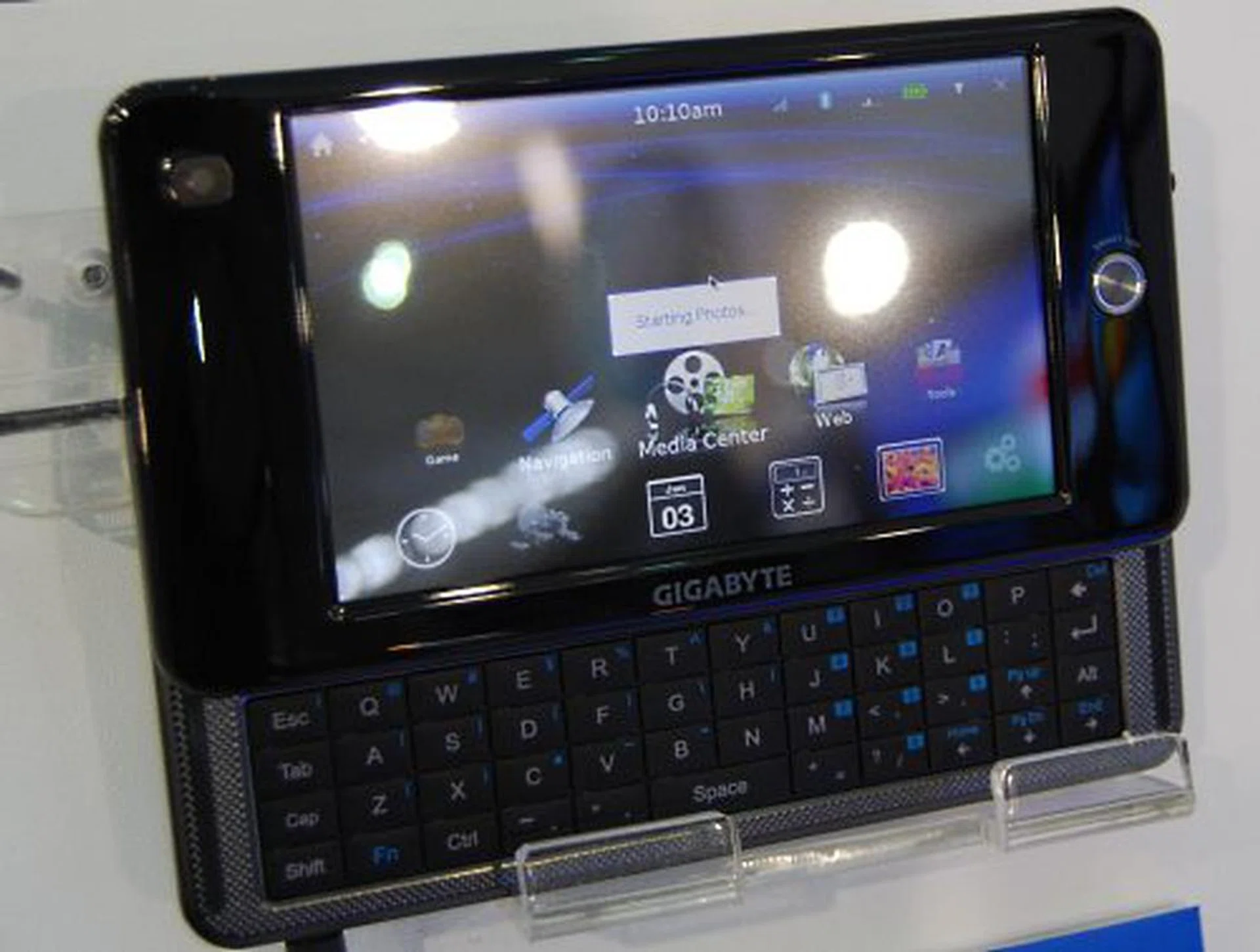  The upcoming M528 will have an Intel Atom processor at 800MHz and uses a Linux OS with what Gigabyte calls a 'Merry-Go-Round i-CON interface'. It is basically a touchscreen device (4.8-inch LCD) with 512MB of onboard memory and using a 4GB SSD for storage. Wireless connectivity is via 802.11b/g (SDIO) or HSDPA (mini card module). Weighing only 340g, it will be available soon in both black and white.  