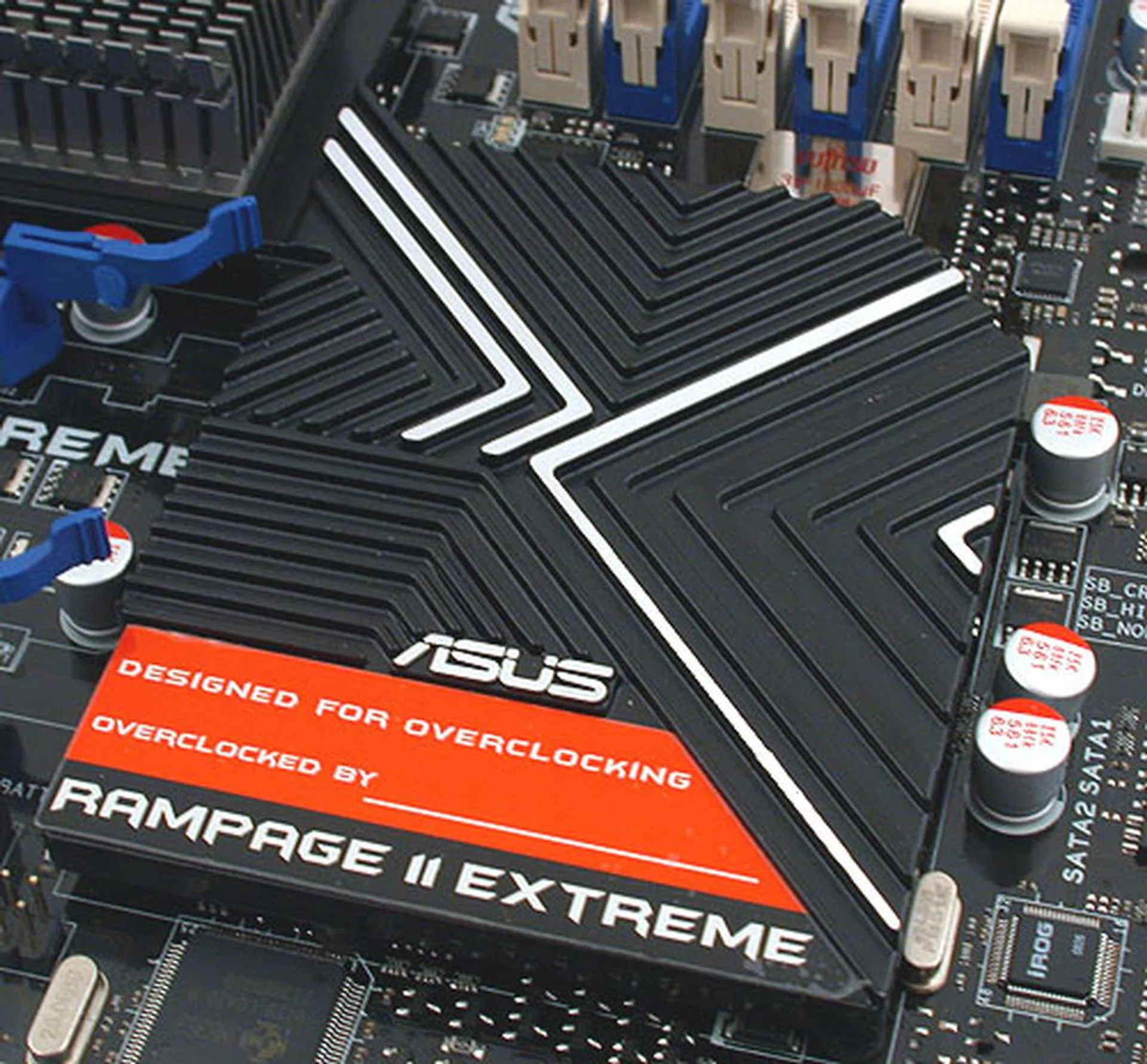 The Southbridge heatsink is also where users sign off on their overclocking achievements. 