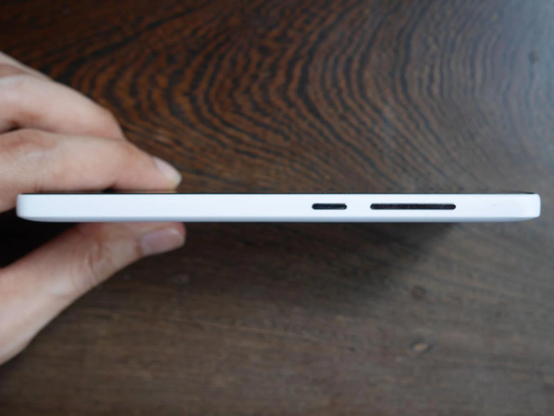 On the right of the phone you have the power button and volume rocker.