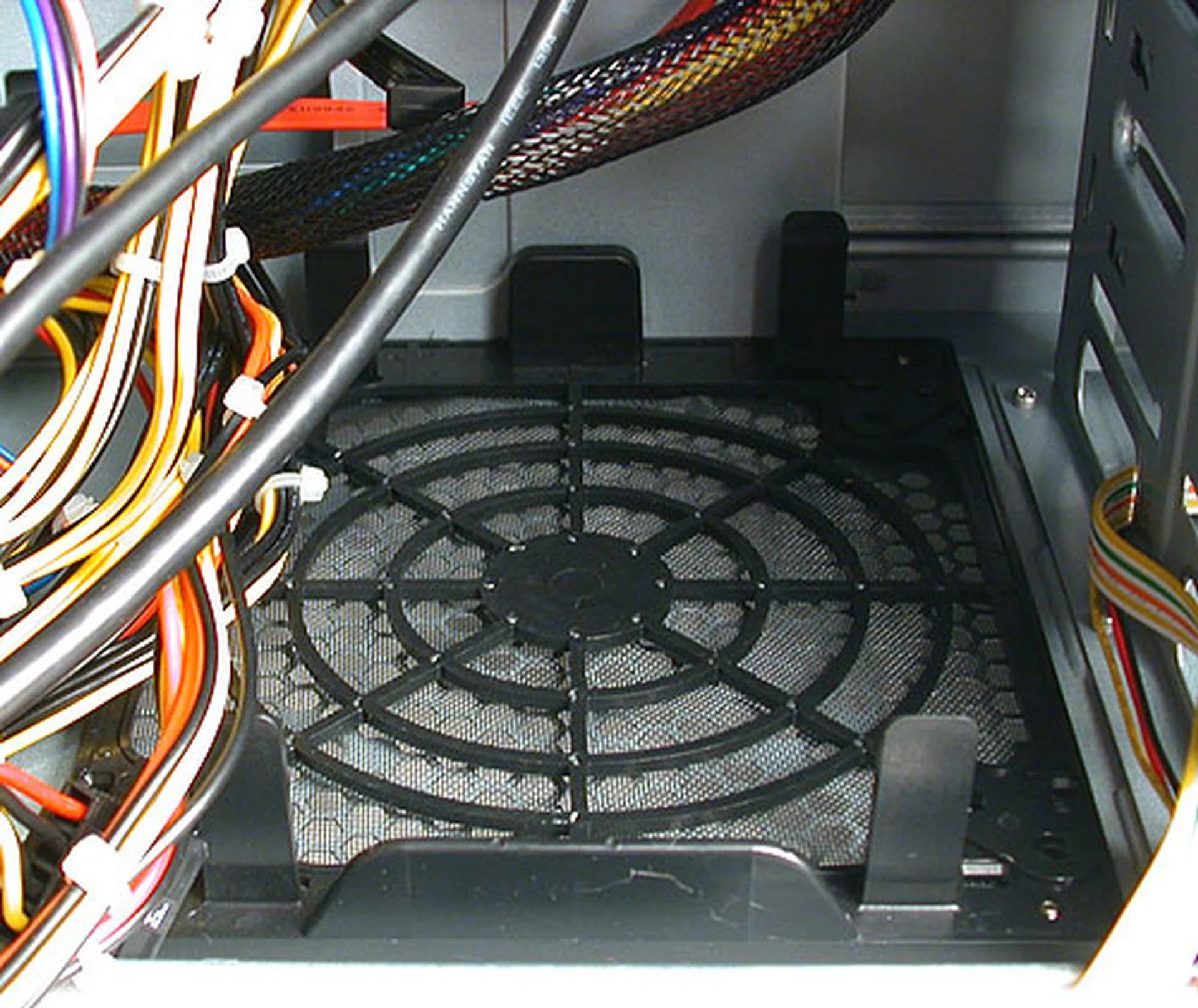 There may be a location here for another fan but with the power cables of the PSU so close to it, we doubt most users would utilize it. 