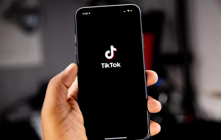 TikTok app on a phone with conventional aspect ratio. Photo by Solen Feyissa on Unsplash.
