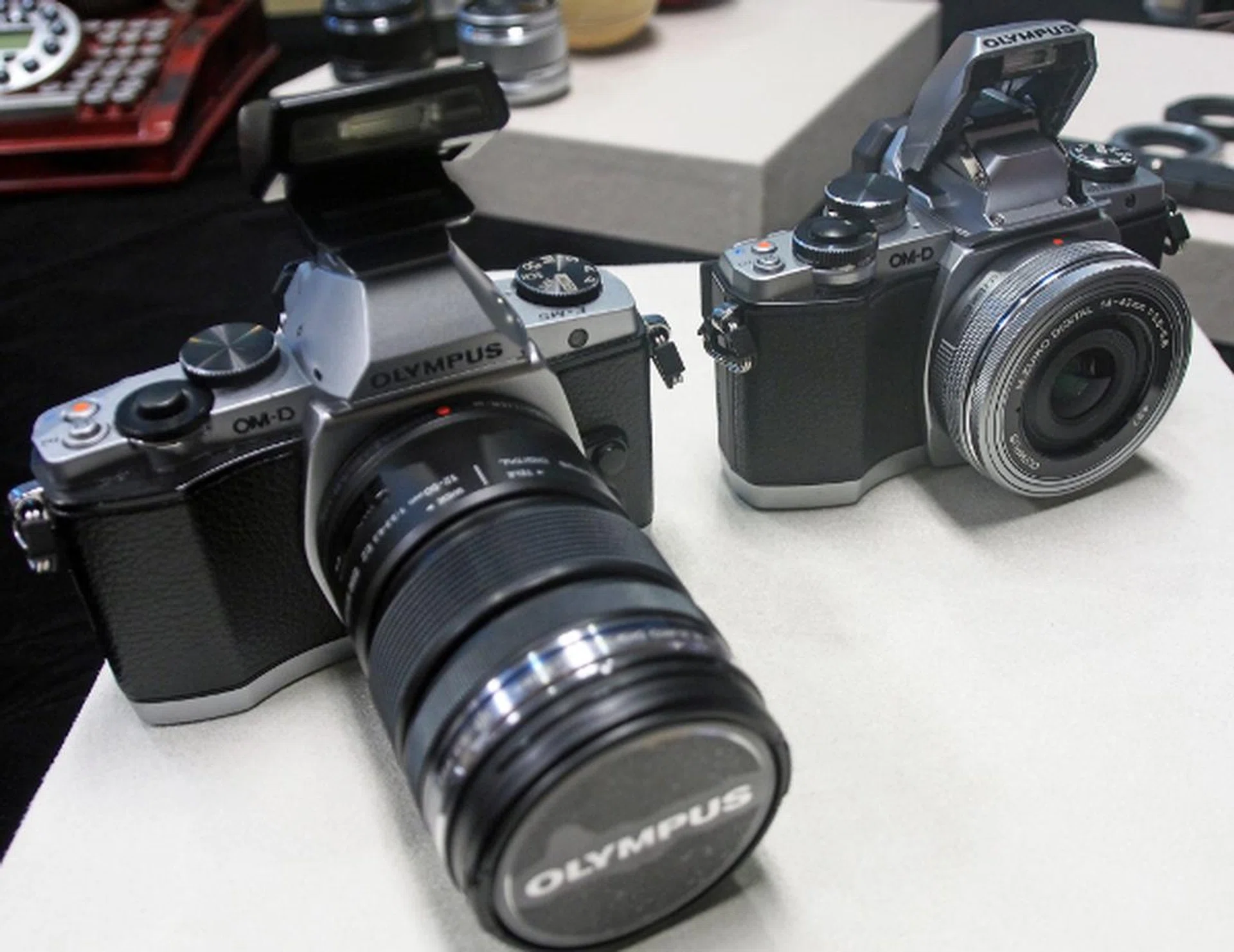 The E-M10 (right) and E-M5 (left) will seem identical to most at a passing glance, unless they are put together side by side.