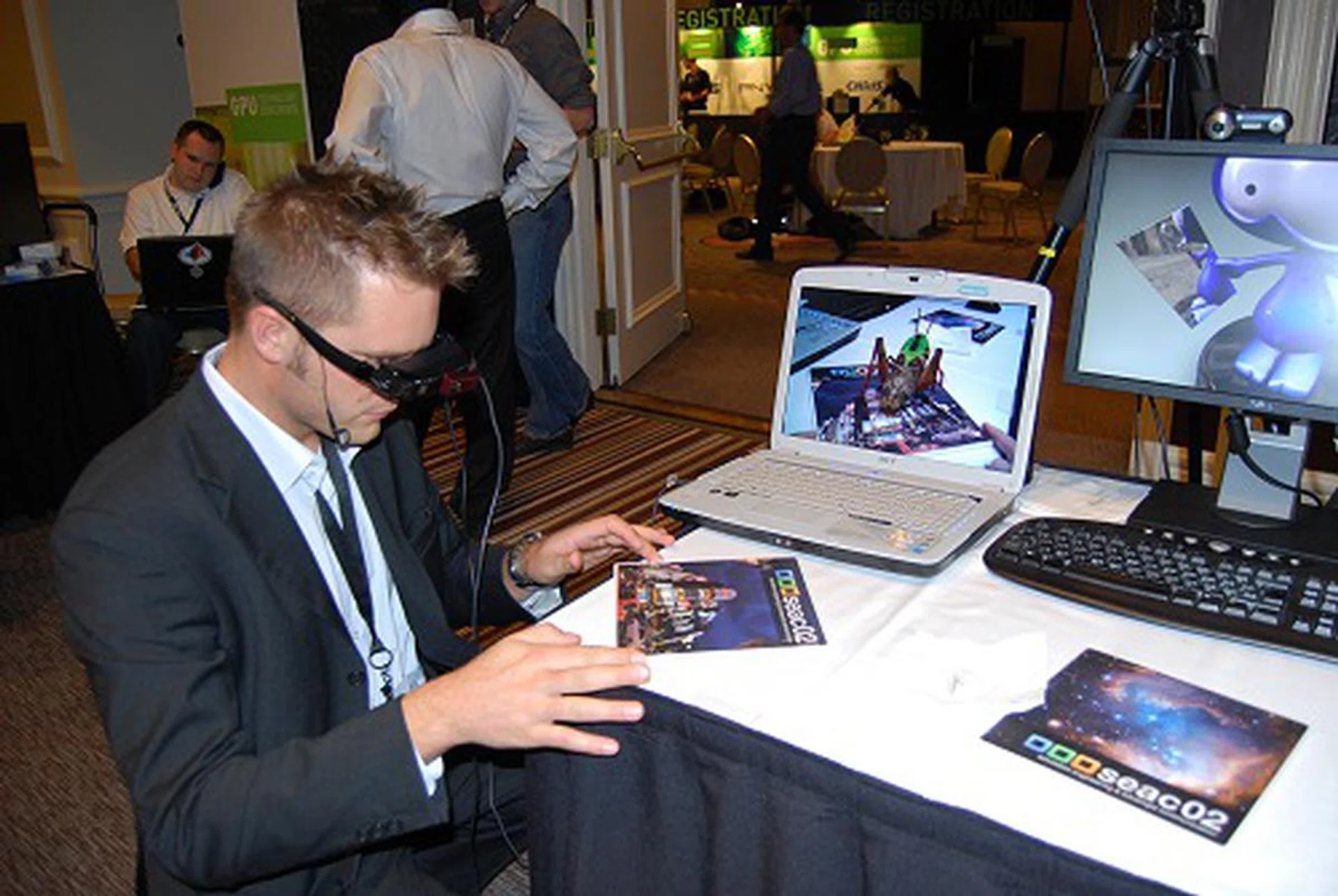 Still at the same booth, another display of augmented reality where the pad was the designated marker for the grasshopper to be jumping while the view was being manipulated by the headset worn by the exhibitor. The software used is built on OpenCL, so this will run any graphics card that supports it.