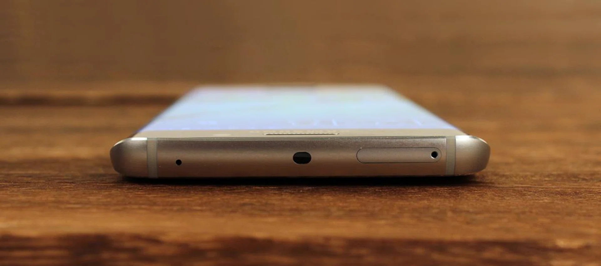 And on the S6 Edge, you'll find the nano-SIM card slot here too.