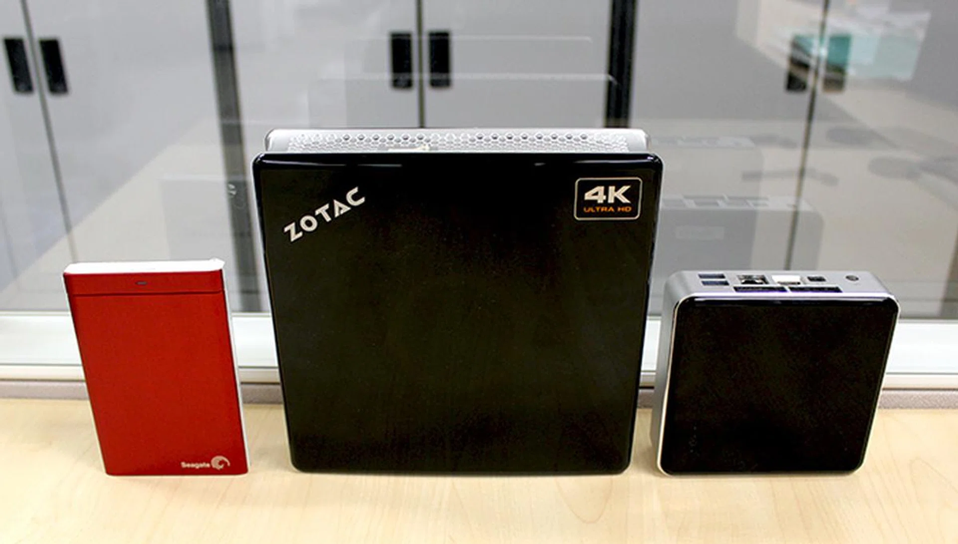 Next to the Zotac ZBOX IQ01 is a regular 2.5-inch portable hard disk drive and the Intel NUC D54250WYB kit. It is significantly larger than the Intel NUC kit Mini-PC, but still relatively compact and portable overall.