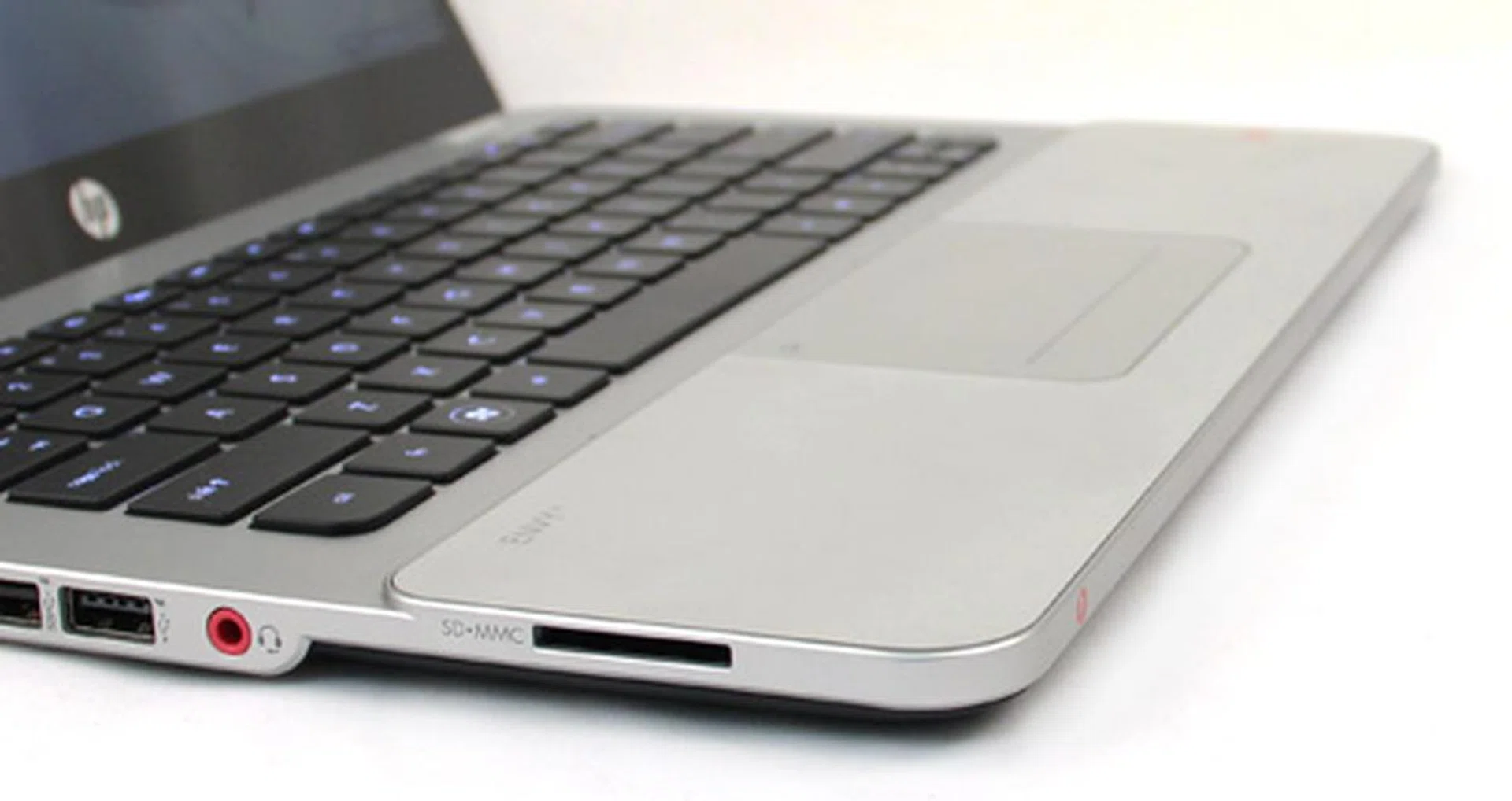 Place phone here! One of the side-benefits of the glass wrist rest is that it doesn't interfere with wireless communications like aluminum would. 