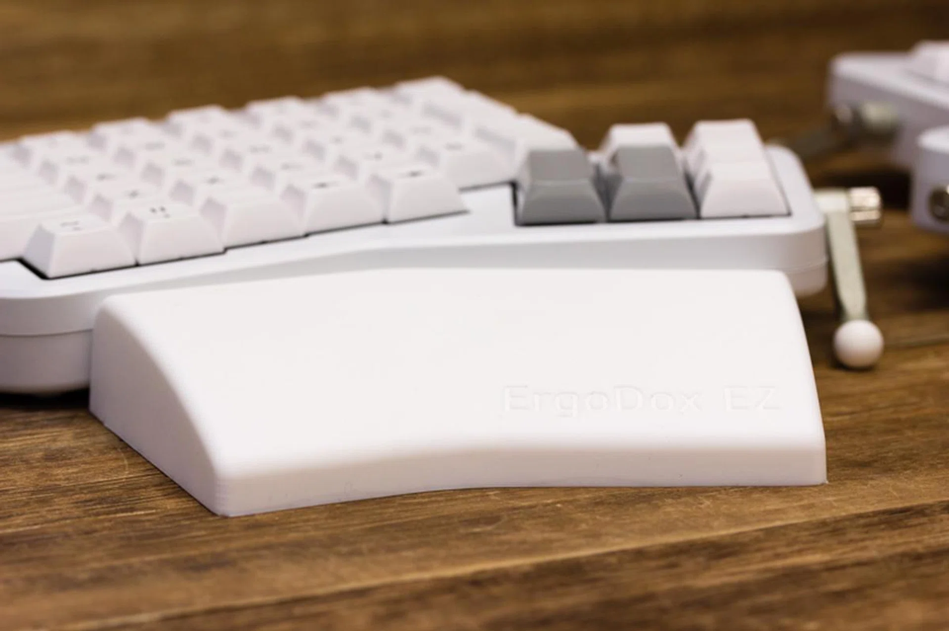The ErgoDox EZ is thick and the keys are substantially elevated above the desk, especially if you tilt the keyboard. That’s why I’d consider the wrist rests a must.