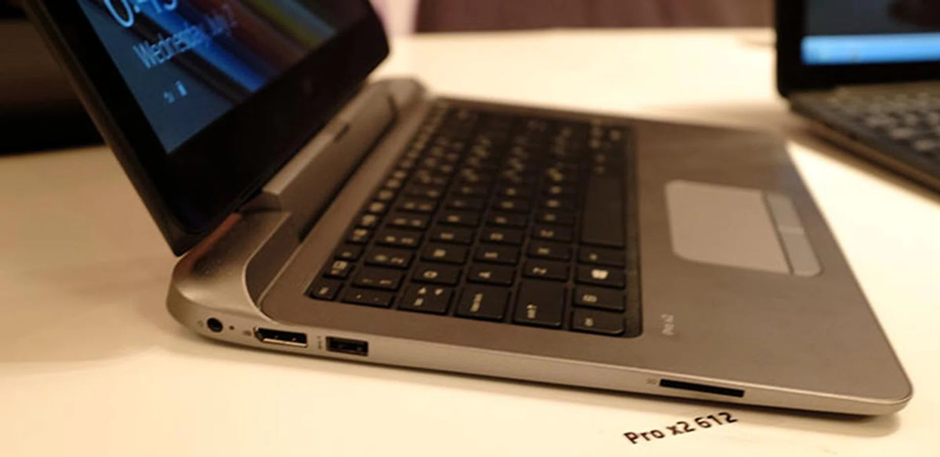 On the left you'll find a DisplayPort port, USB 3.0 and an SD card reader.