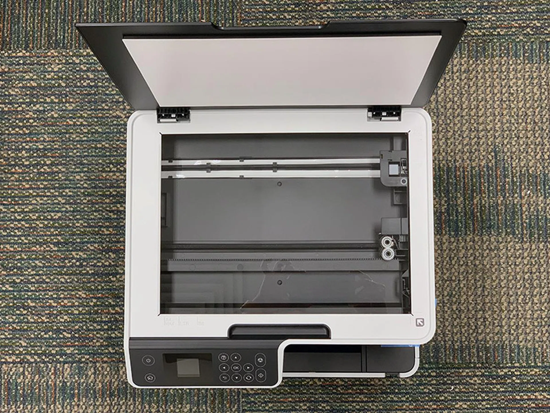 The M2140 is also a scanner and copier - but it doesn't have an ADF.