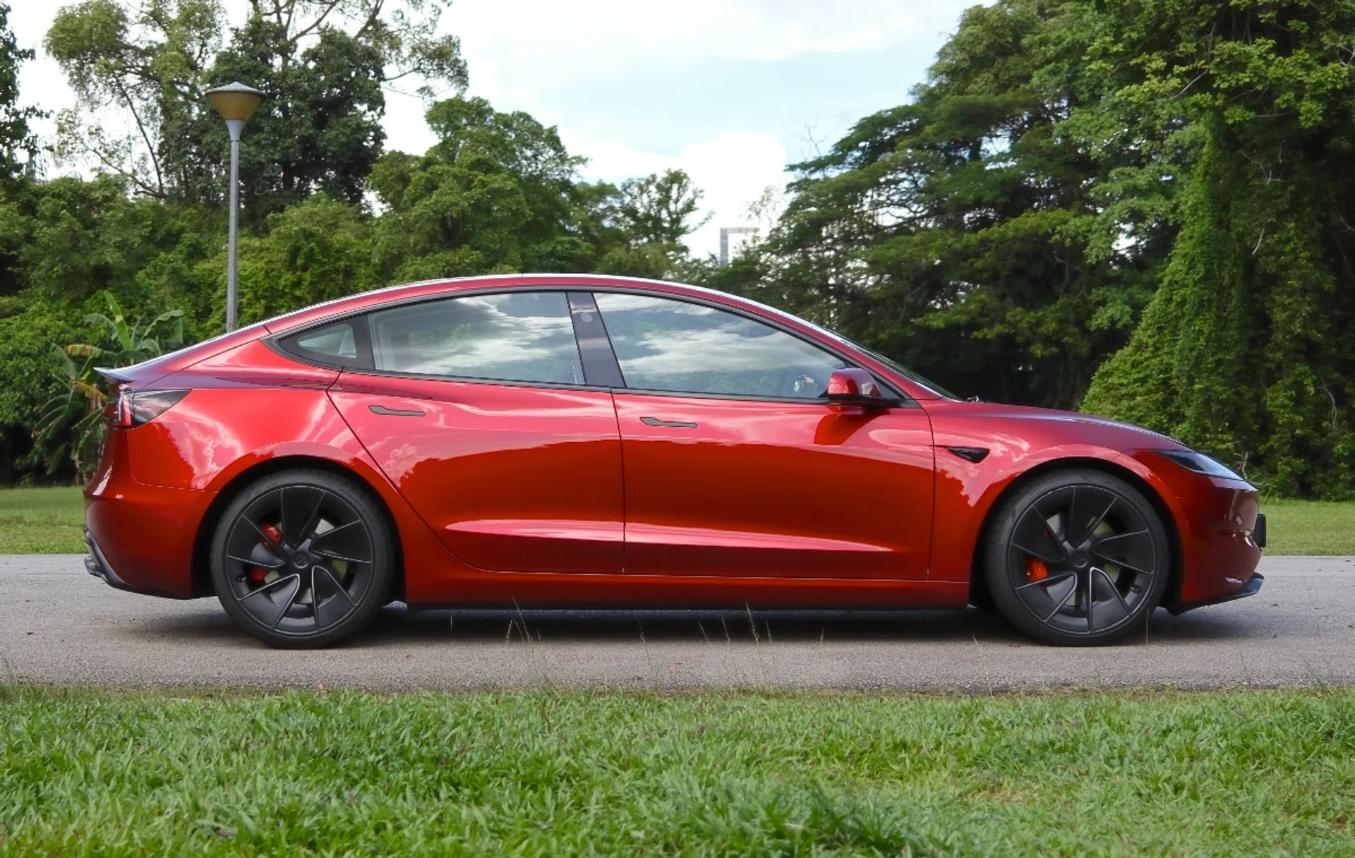 The Model 3 Performance I test drove earlier in the year came in Ultra Red, which is a S$3,200 option. Photo: HWZ