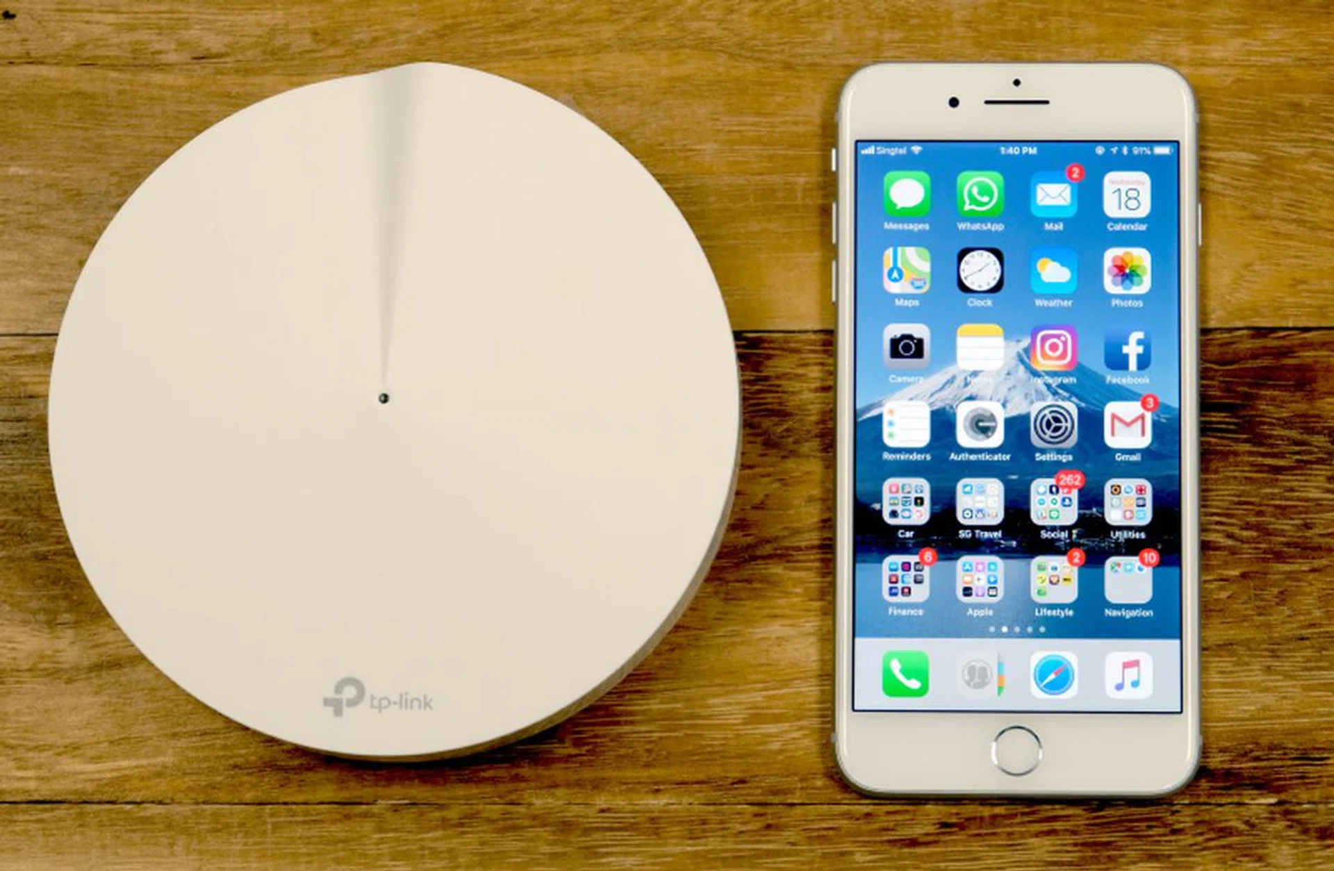 To give you a better idea of the Deco M9 Plus' size, here it is next to an iPhone 8 Plus.
