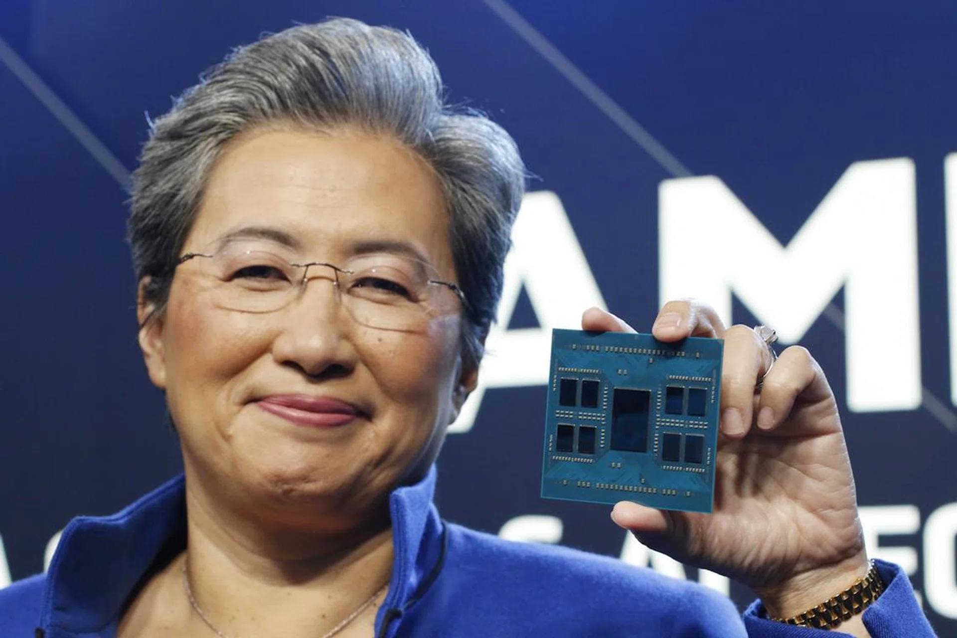 AMD CEO Dr. Lisa Su holding up the new 4th-gen EPYC "Bergamo" cloud native server CPU.