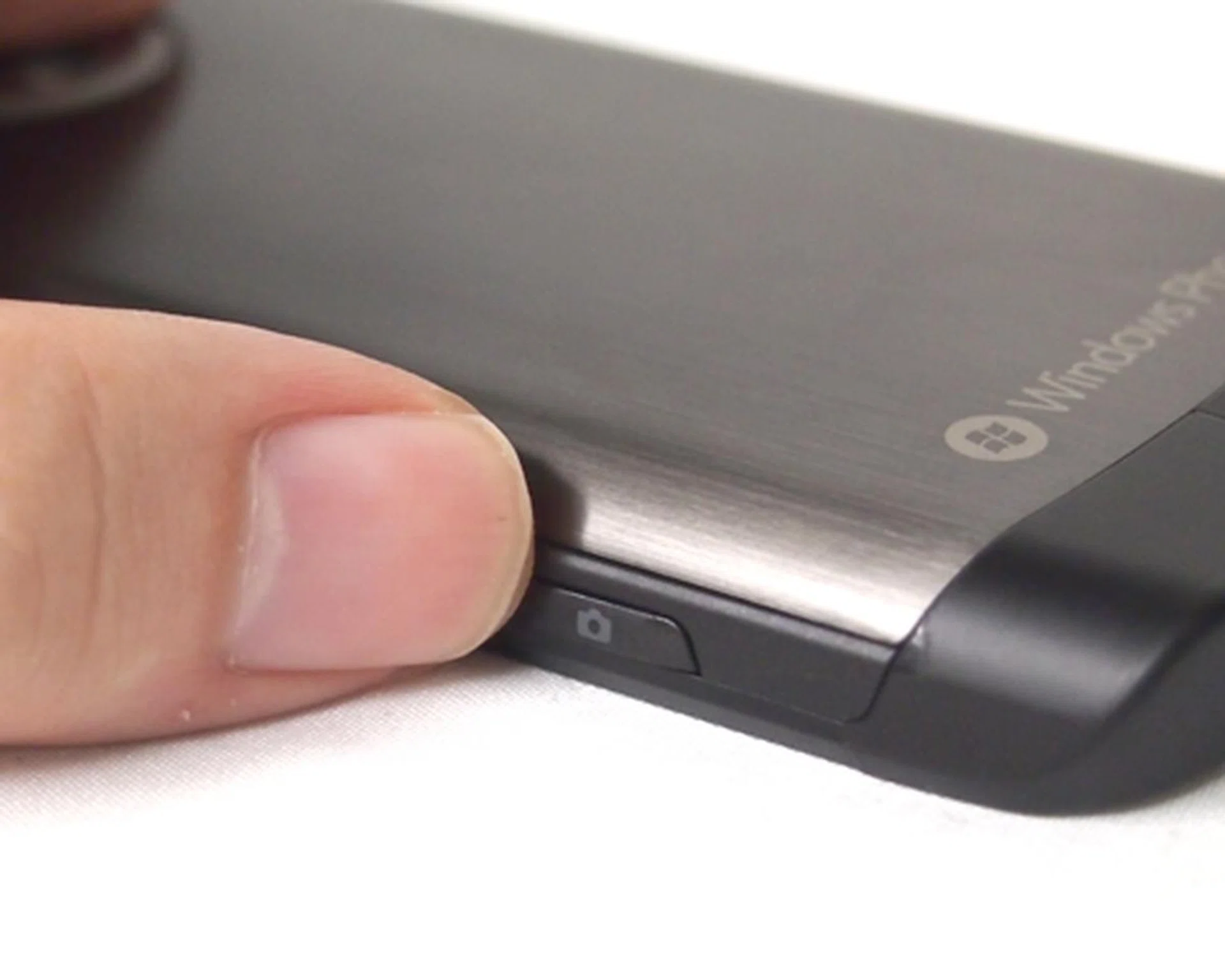 Press and hold the Camera button to activate your camera, even when the device is locked.