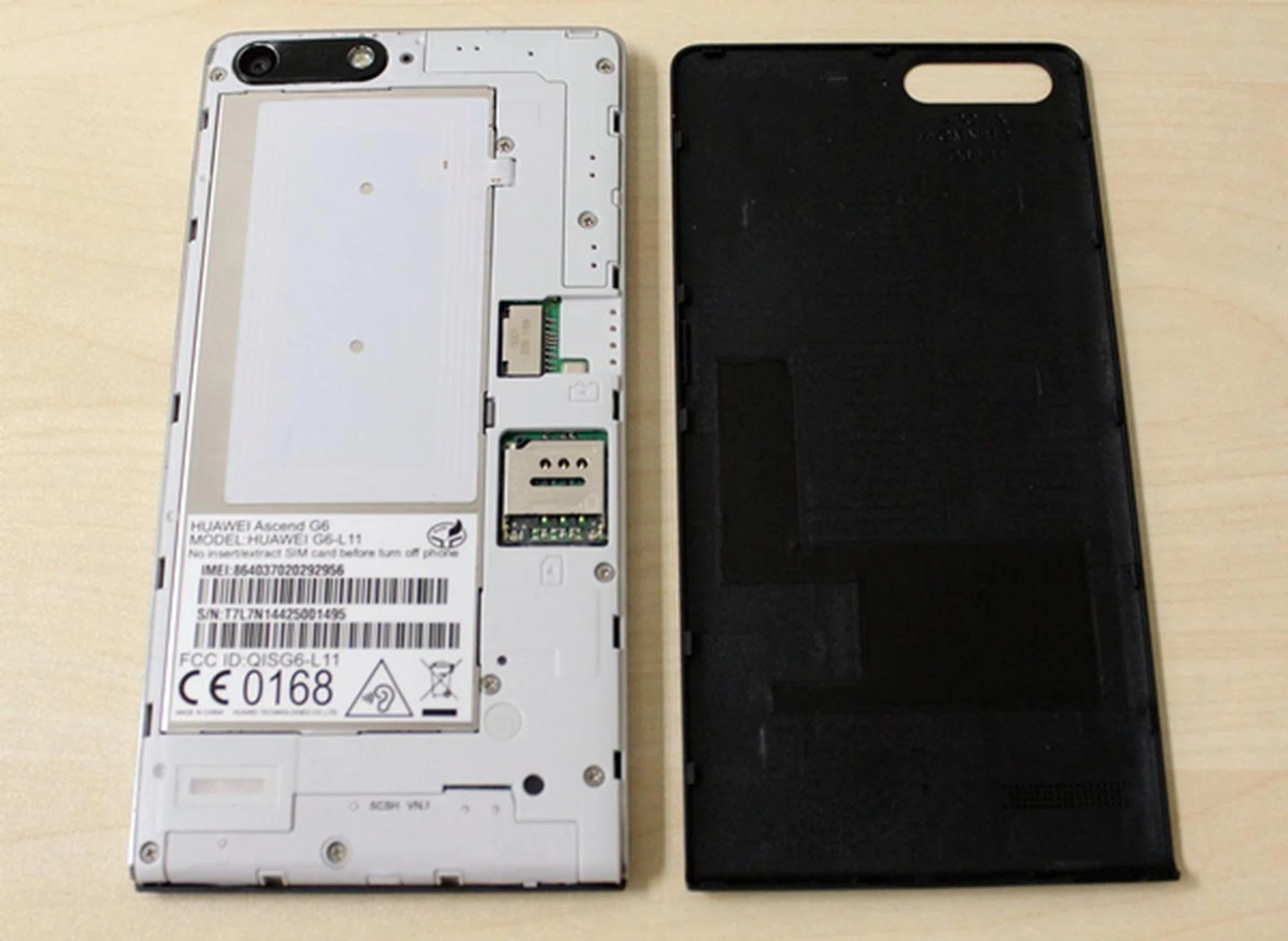 You can remove the rear cover to access the microSD and micro-SIM card slots, but the 2,000mAh battery is embedded.
