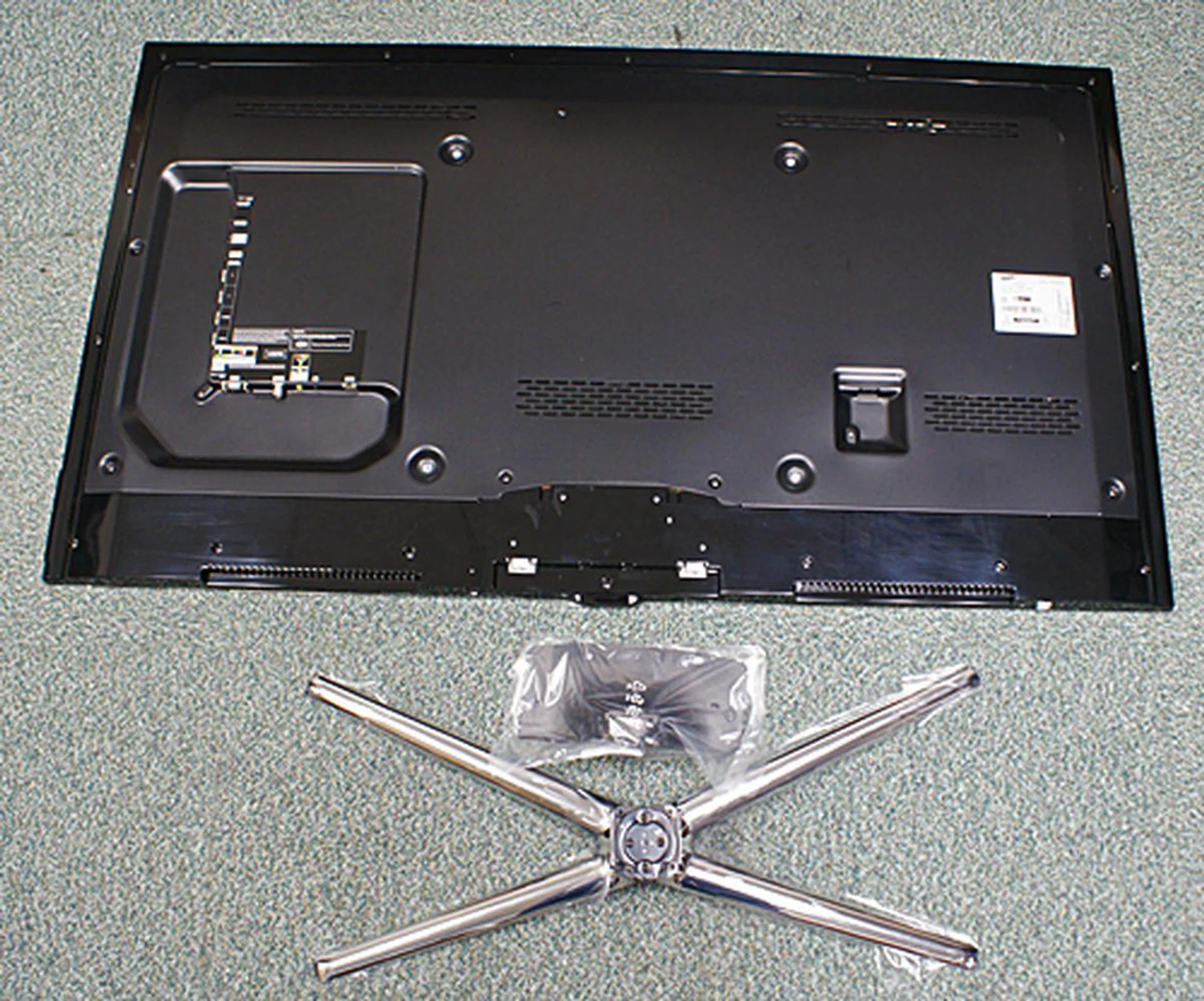 The back of the TV houses the essential sockets. Assembly is a relatively easy process. All you need to do is screw in the new quad stand and you are ready to go. Handle with care as the TV is pretty large and the screen is heavy. It's advisable to have another person to assist at this setup stage.
