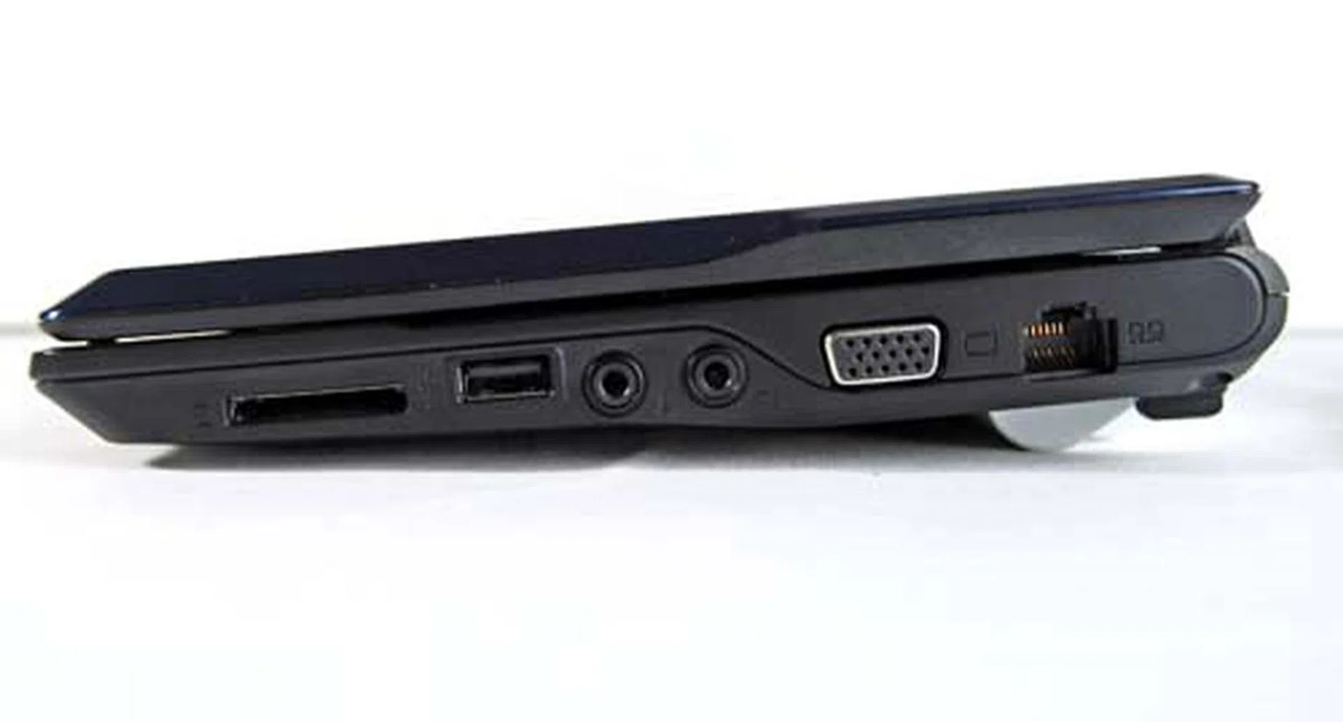  a card reader, USB port, audio jacks, VGA out and LAN cable.