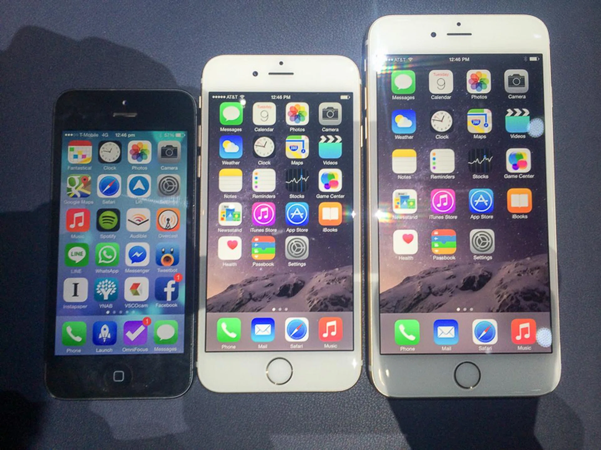How big is big? Here's the iPhone 5 (left) next to an iPhone 6 (center) and iPhone 6 Plus (right).