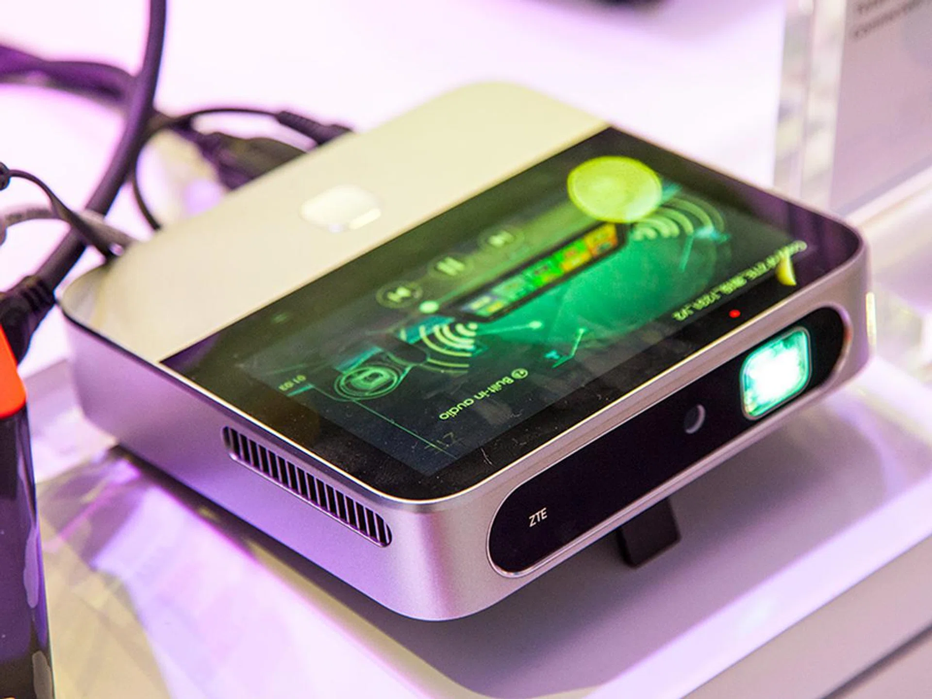 This ZTE projector comes with Android 4.4 as its operating system and a Qualcomm Snapdragon 800 2.1GHz processor. This unique projector will play most popular video formats (MP4, H.264) and will run Android apps at the same time. The tiny DLP projector has a video resolution of only 720p and will output a maximum of 230 Lumens.