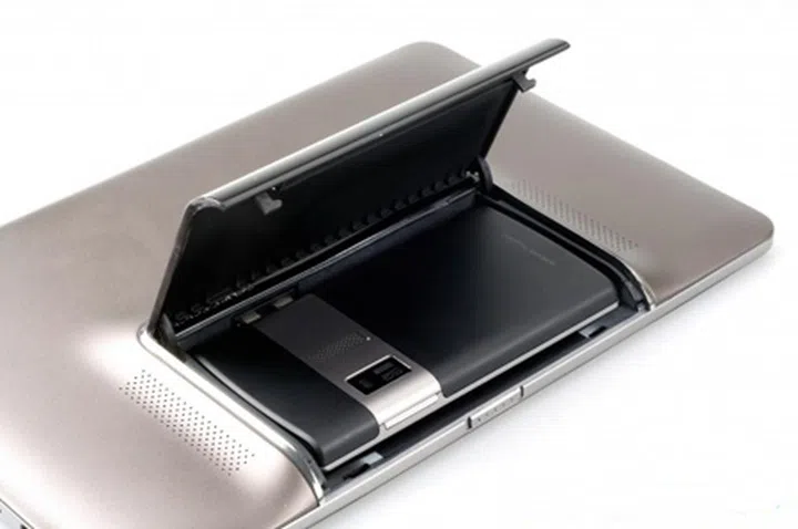 The ASUS Padfone reveals a smartphone / tablet hybrid unlike anything we've seen as it features a special compartment to mate with a smartphone. Possibilities include extending the smartphone's battery life and a larger screen experience.
