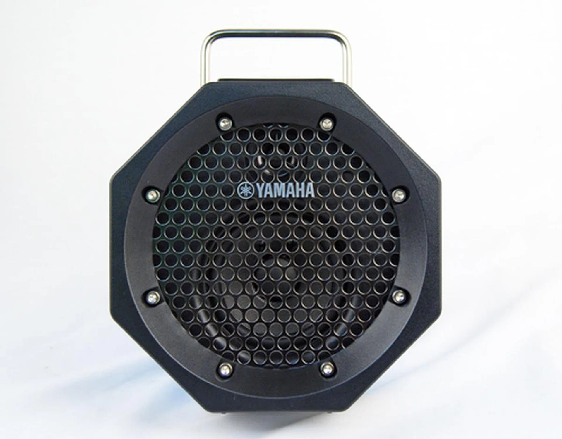 Head on, the octagonal shape of the portable speaker is evident. 