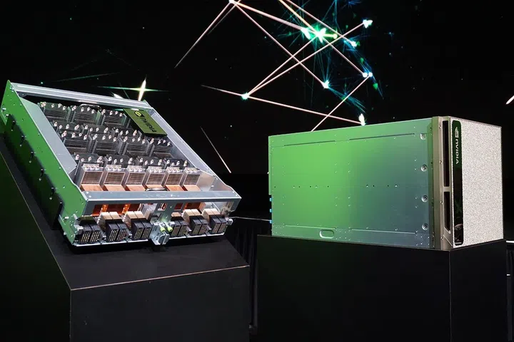 The NVIDIA DGX-2 supercomputer and half its first layer of innards exposed.