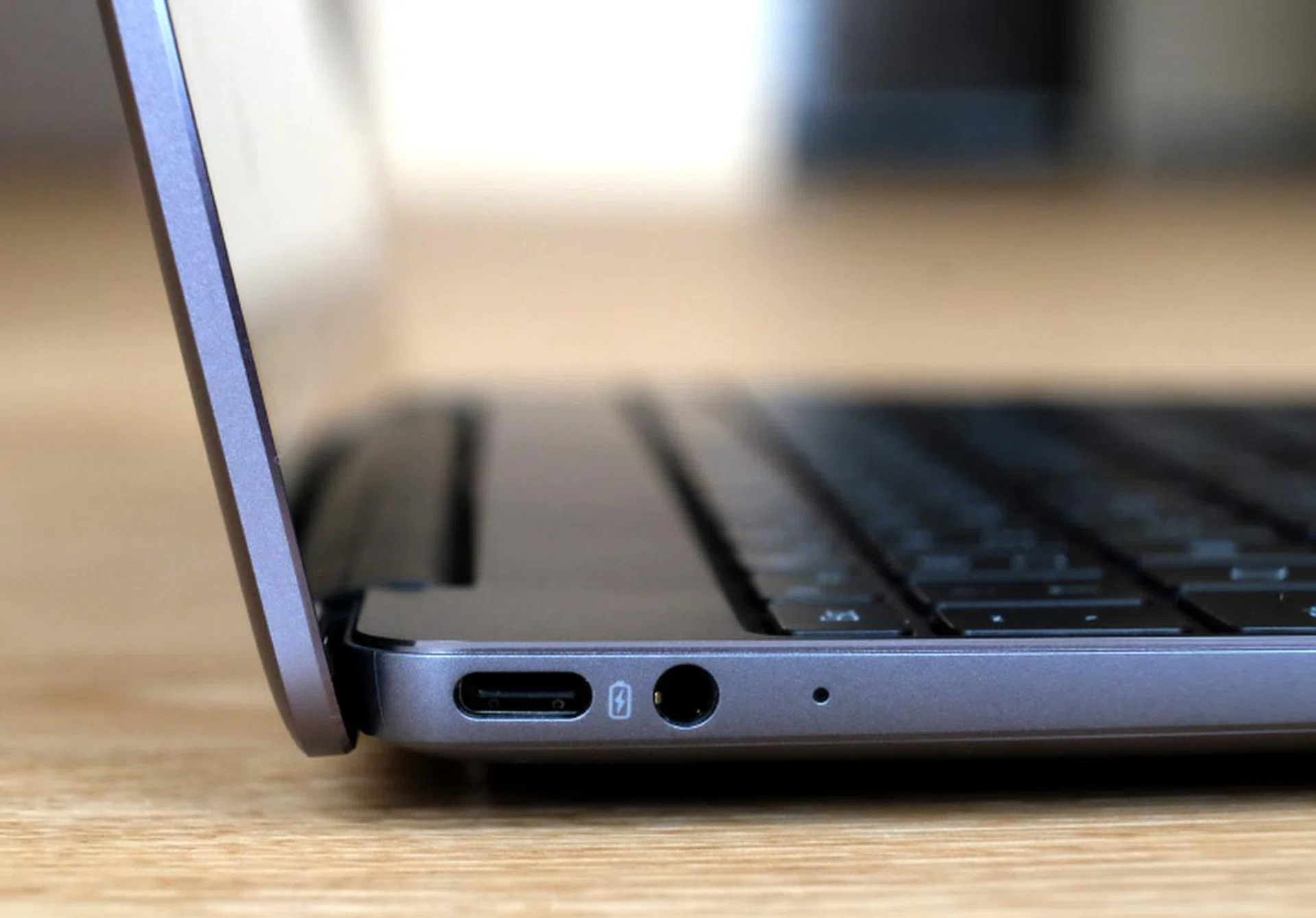 There's two USB-C port but only the one of the left supports power charging. There's a headphone jack but no memory card reader of any sort.